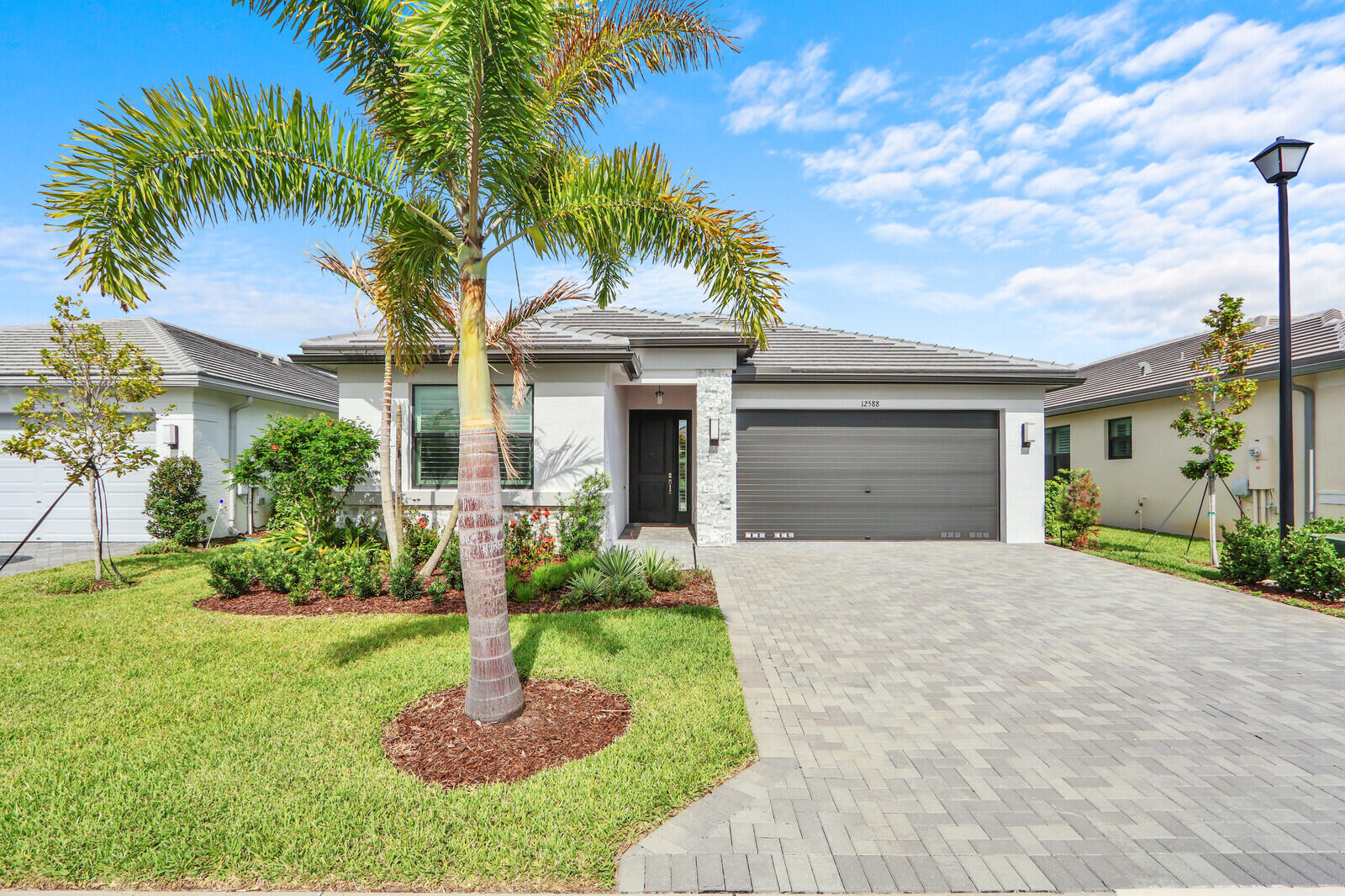 Foto de propiedad en 12588 SW Manatee Marsh Terrace, Port St. Lucie, FL 34987 Port St. Lucie con MLS# 