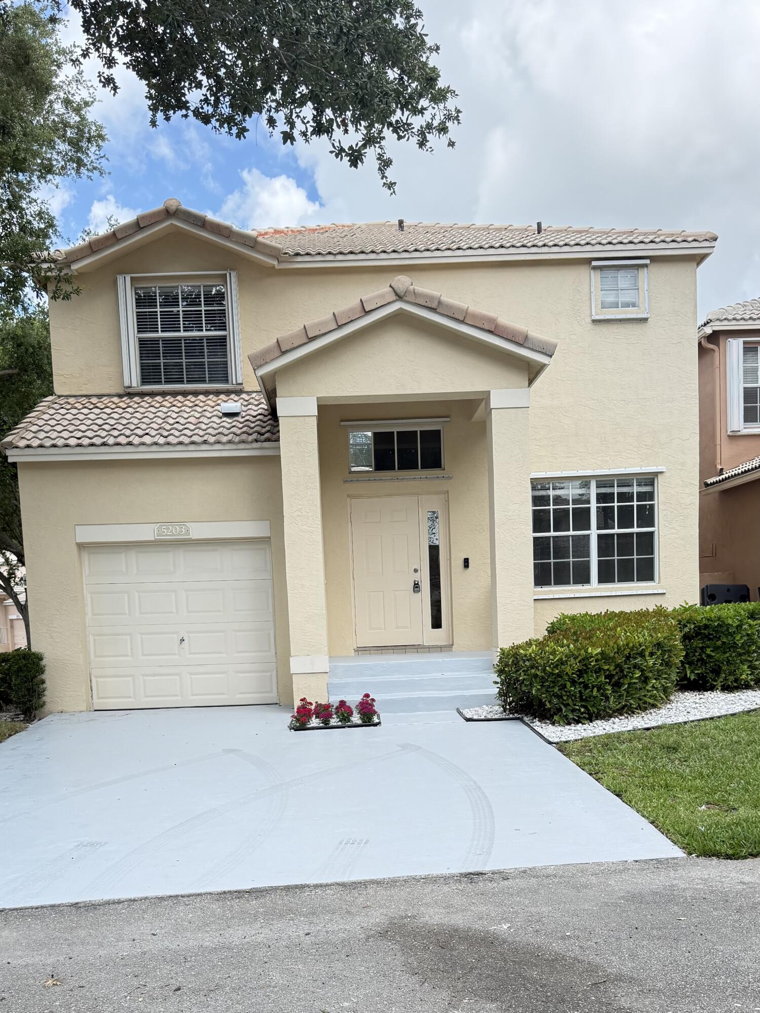 Foto de propiedad en 5203 Eagle Cay Place, Coconut Creek, FL 33073 Coconut Creek con MLS# 