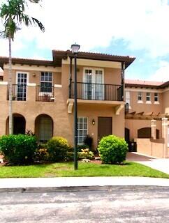Foto de propiedad en 6898 Julia Gardens Drive, Coconut Creek, FL 33073 Coconut Creek con MLS# 