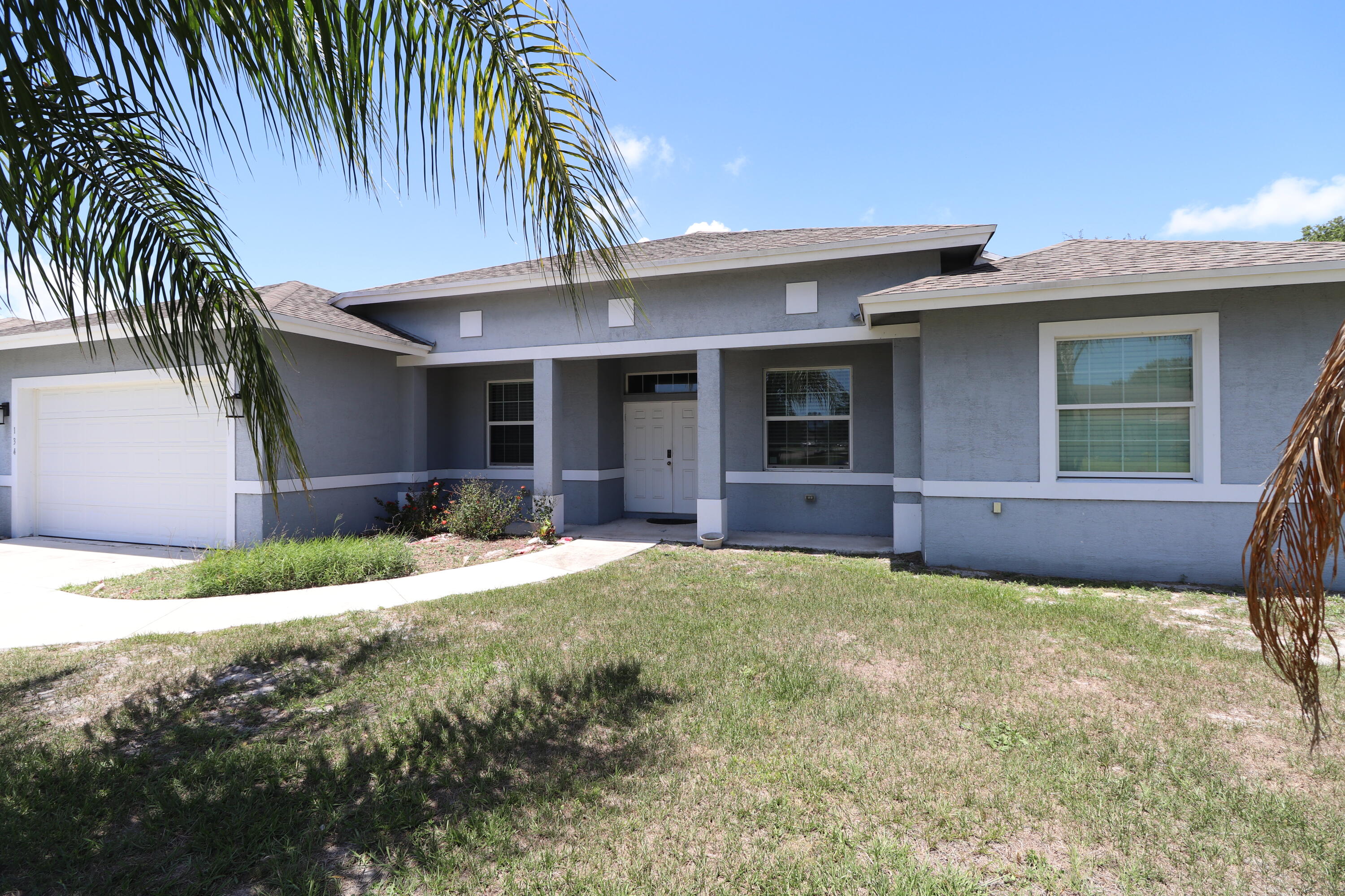 Foto de propiedad en 134 NW Heather Street, Port St. Lucie, FL 34983 Port St. Lucie con MLS# 