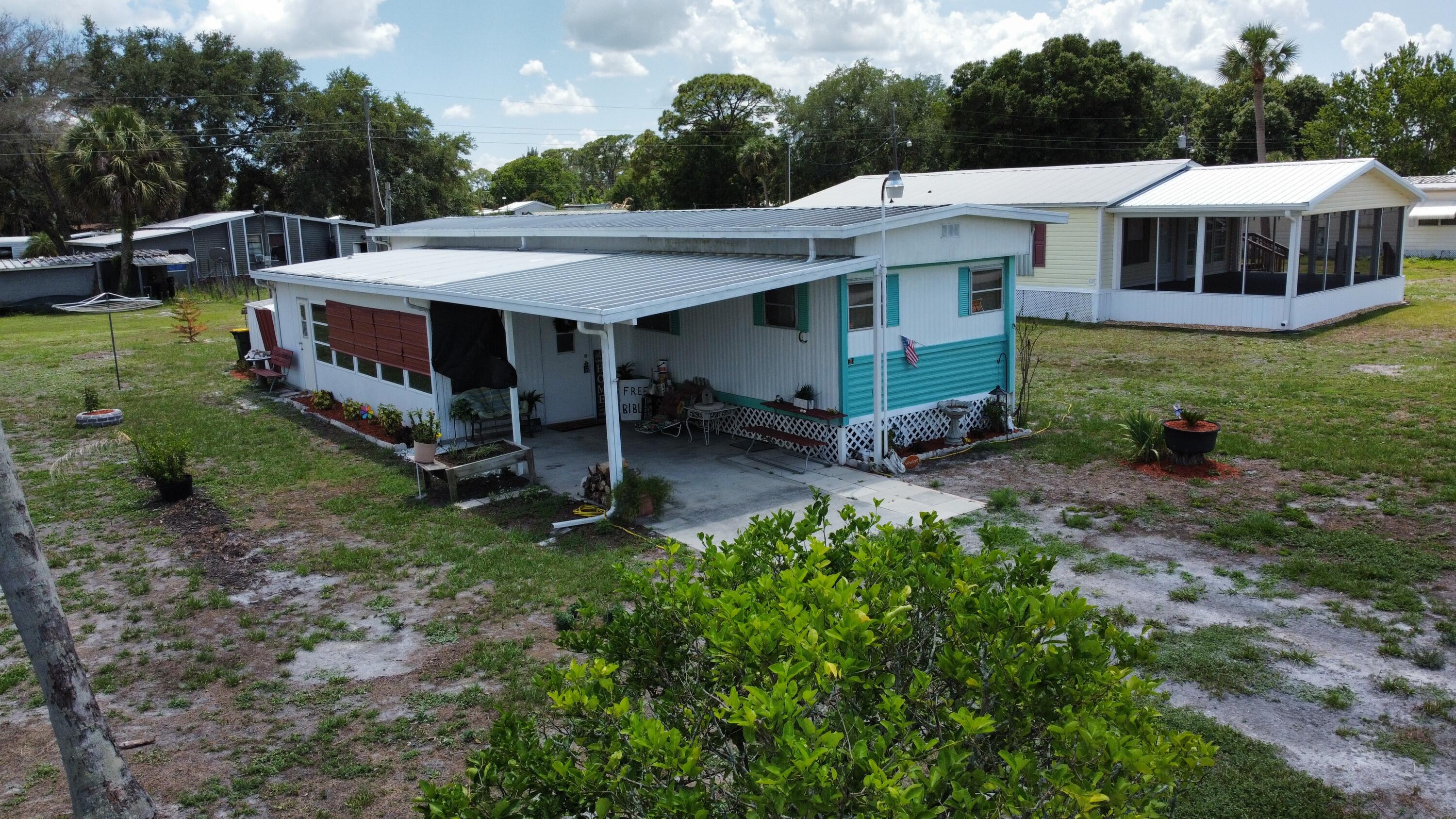 Foto de propiedad en 17408 Broadwing Lane, Okeechobee, FL 34974 Okeechobee con MLS# 
