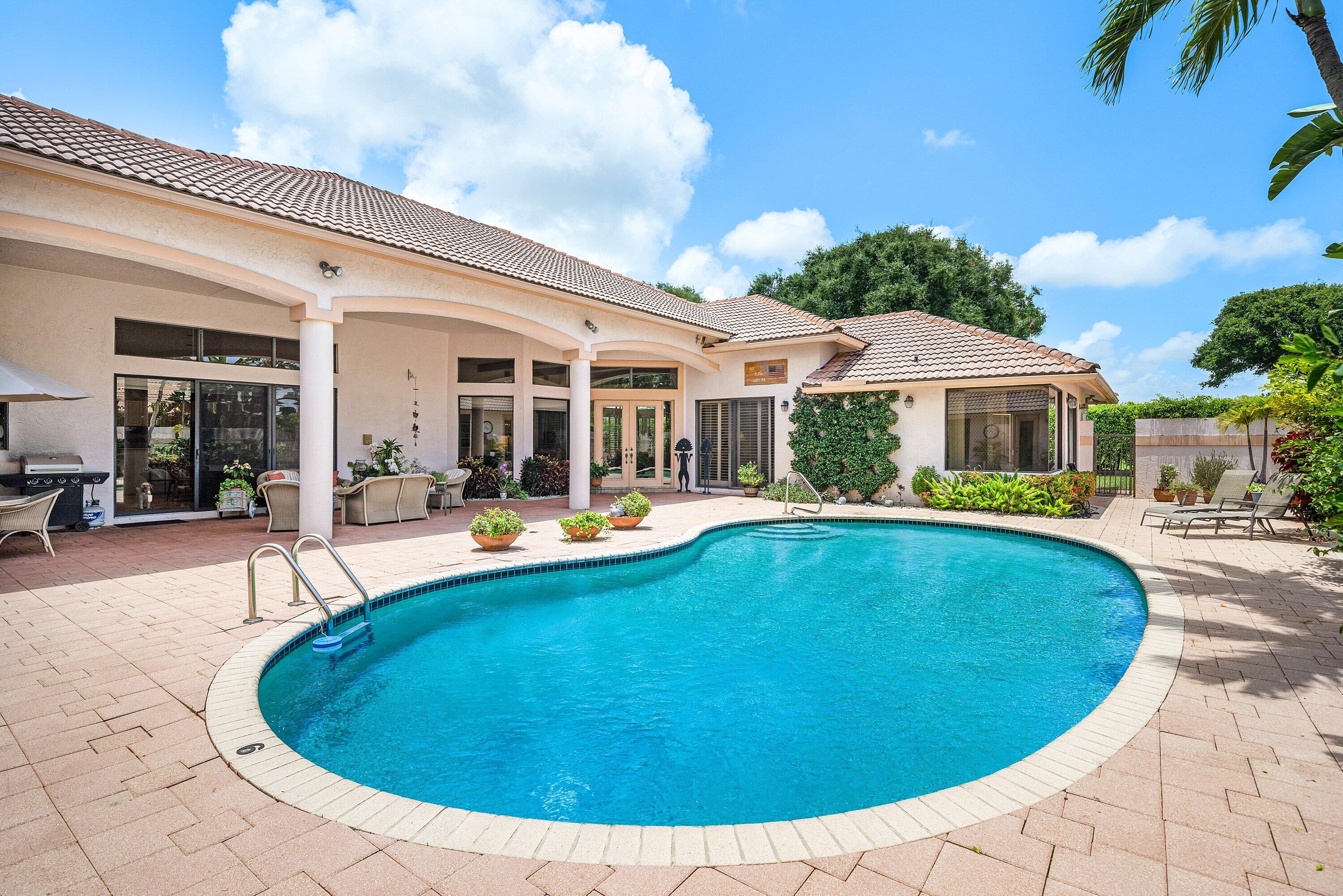 Foto de propiedad en 4727 Bocaire Boulevard, Boca Raton, FL 33487 Boca Raton con MLS# 