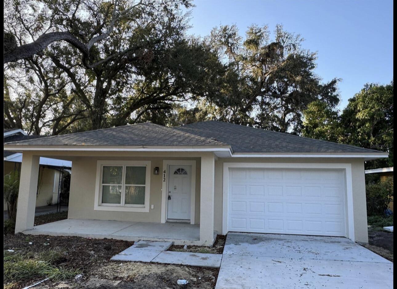 Foto de propiedad en 412 NE Avenue M NE, Winter Haven, FL 33881 Winter Haven con MLS# 