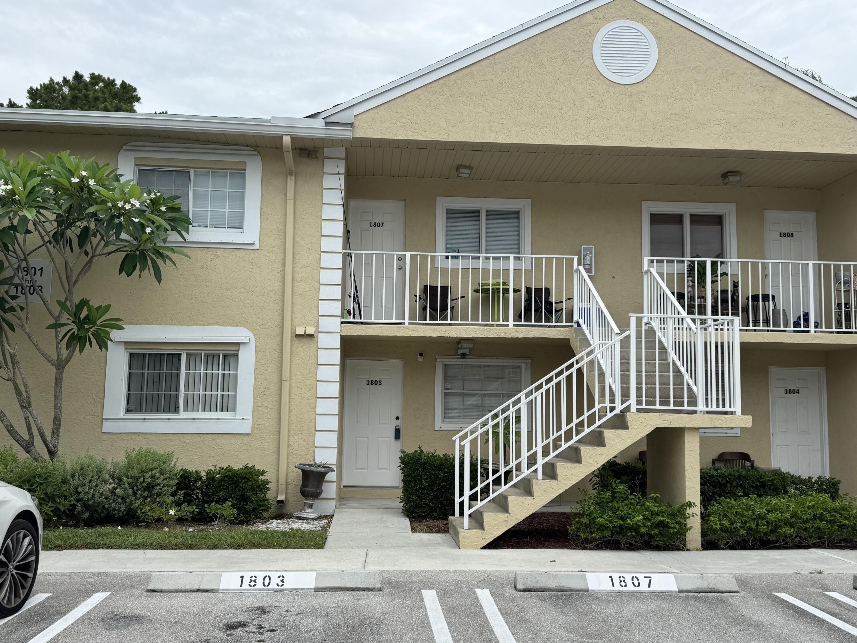 Foto de propiedad en 1803 Palm Beach Trace Drive, Royal Palm Beach, FL 33411 Royal Palm Beach con MLS# 