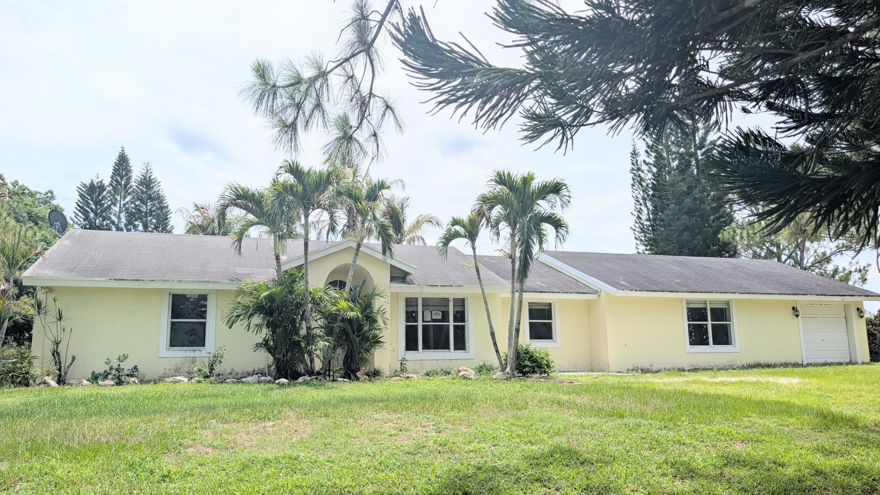 Foto de propiedad en 14790 N 87th St Street N, The Acreage, FL 33470 The Acreage con MLS# 