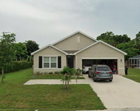 Foto de propiedad en 5015 NW North Macedo Boulevard, Port St. Lucie, FL 34983 Port St. Lucie con MLS# 