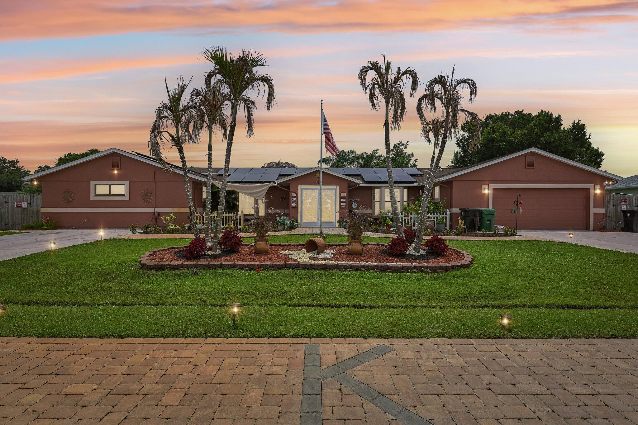 Foto de propiedad en 2457 SW Mercer Street, Port St. Lucie, FL 34984 Port St. Lucie con MLS# 