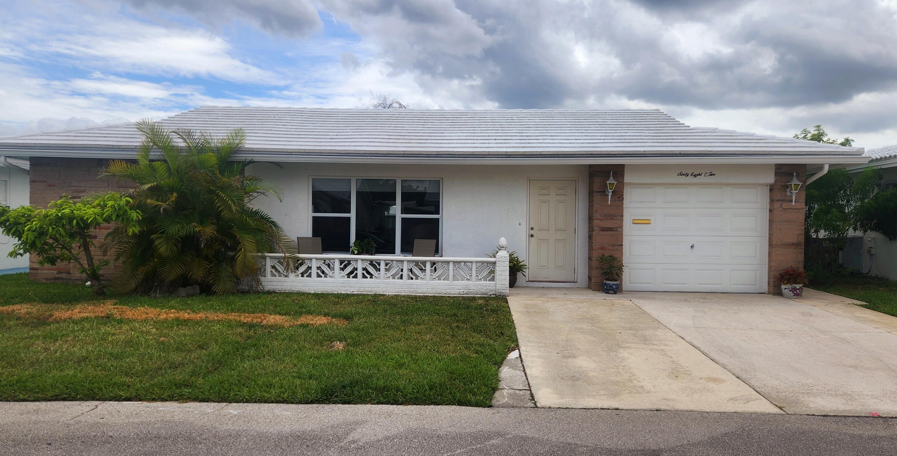 Foto de propiedad en 6802 NW 74th Place, Tamarac, FL 33321 Tamarac con MLS# 