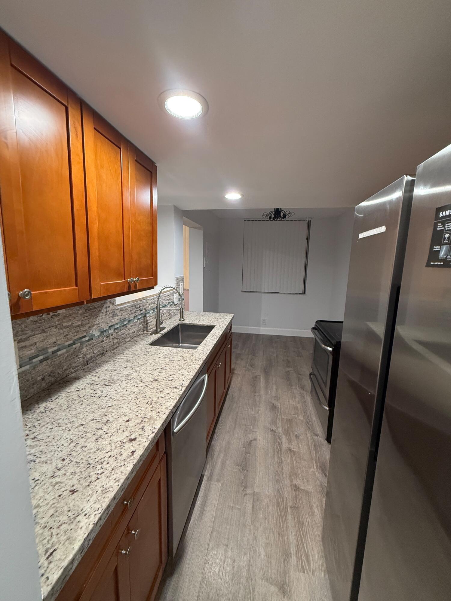 Foto de propiedad en 6190 Woodlands Boulevard 110, Tamarac, FL 33319 Tamarac con MLS# 