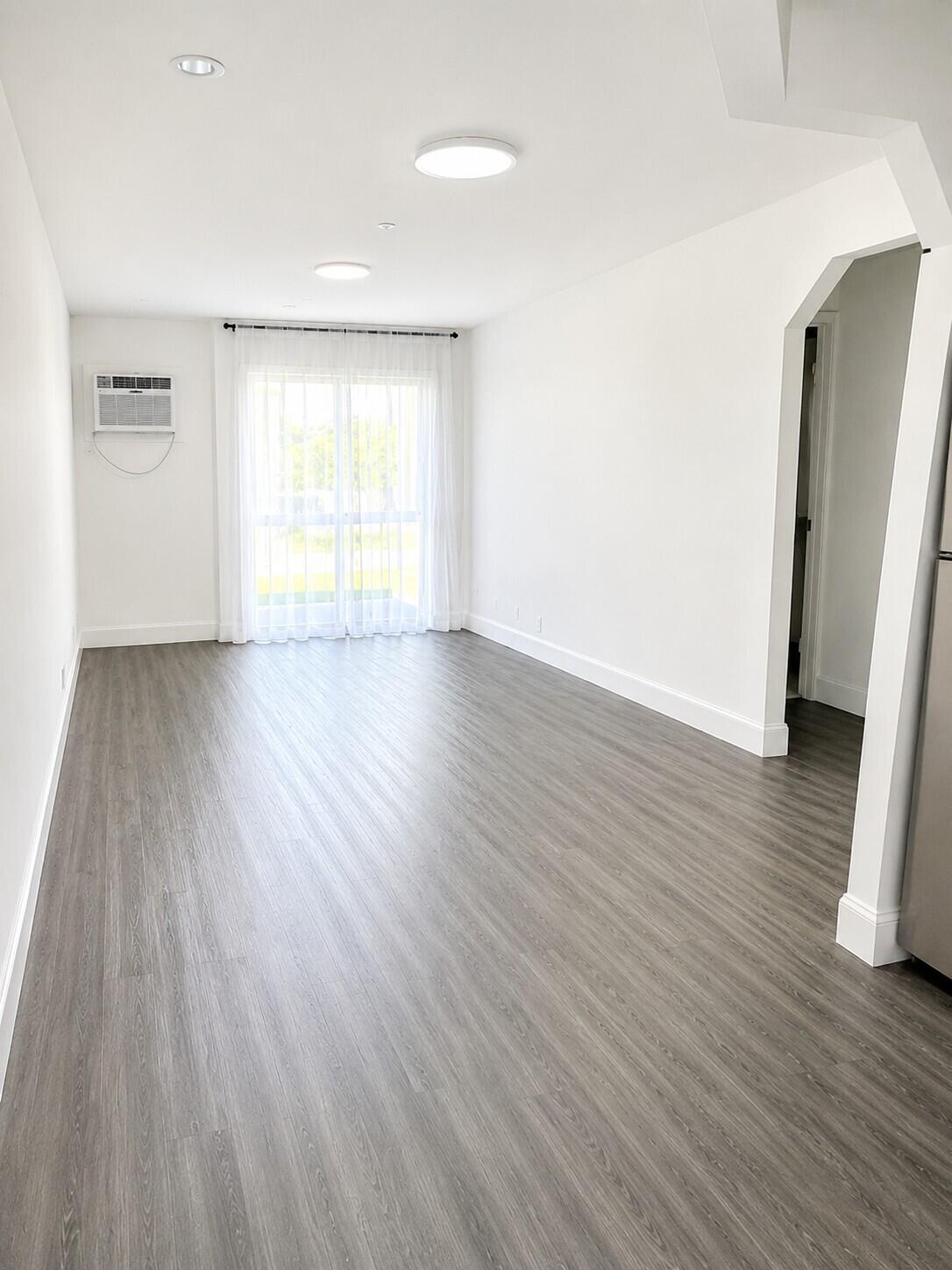 This image has been digitally enhanced using AI to improve lighting and brightness. No material features of the property were intentionally added, removed, or altered.