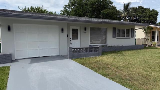 Foto de propiedad en 7315 NW 57th Place, Tamarac, FL 33321 Tamarac con MLS# 