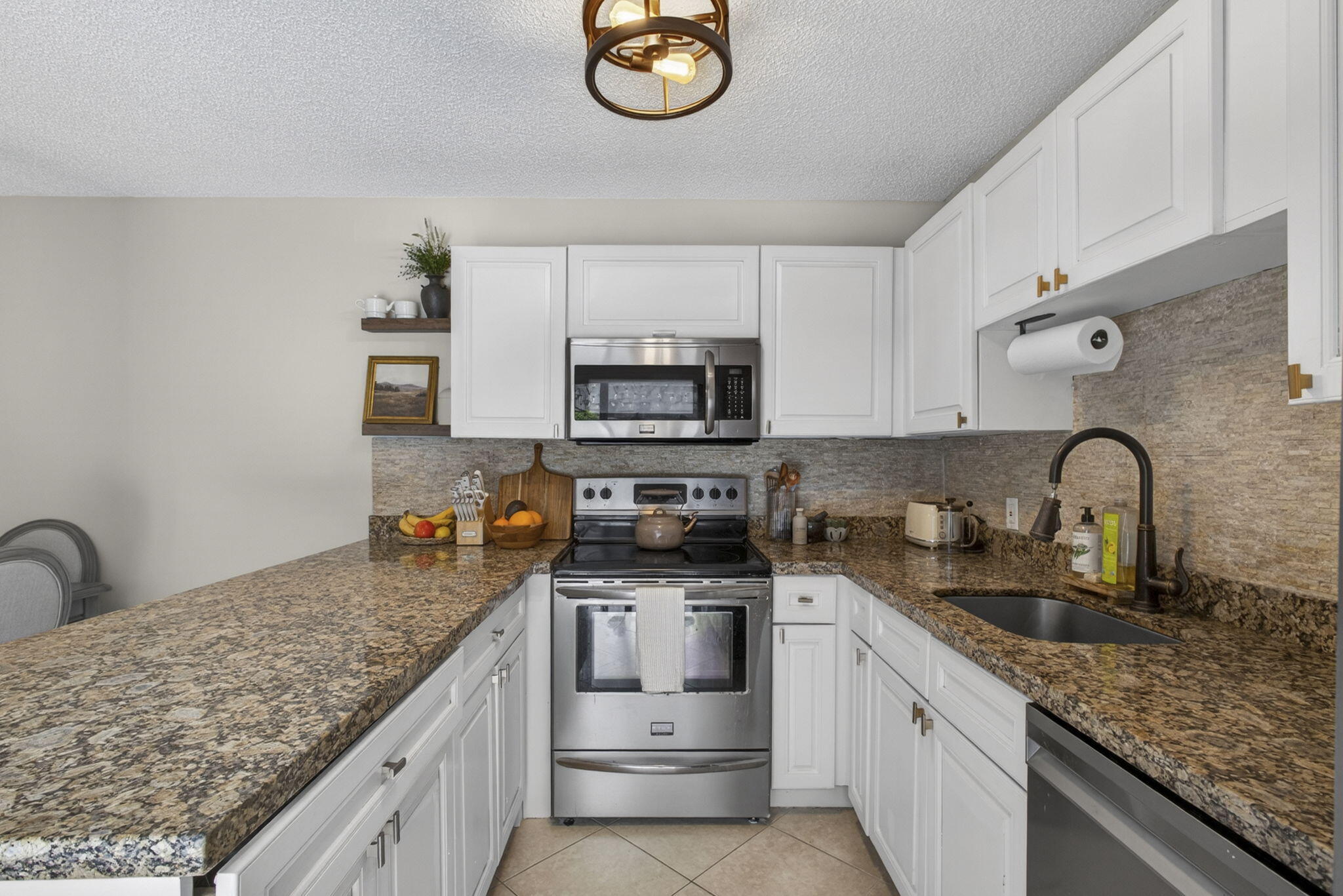 Foto de propiedad en 121 1st Terrace, Palm Beach Gardens, FL 33418 Palm Beach Gardens con MLS# 