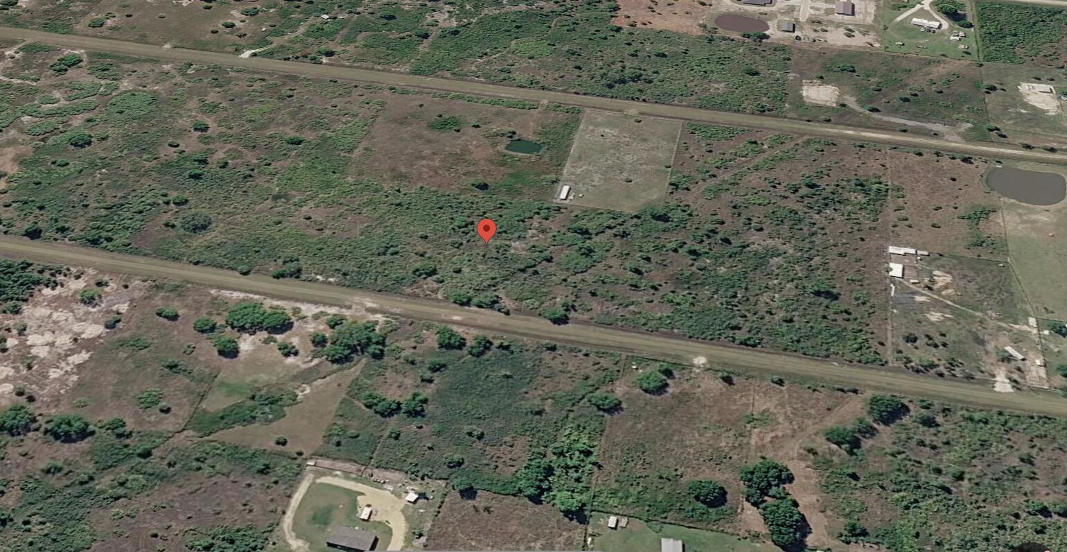 Foto de propiedad en 15580 NW 266th Street, Okeechobee, FL 34972 Okeechobee con MLS# 