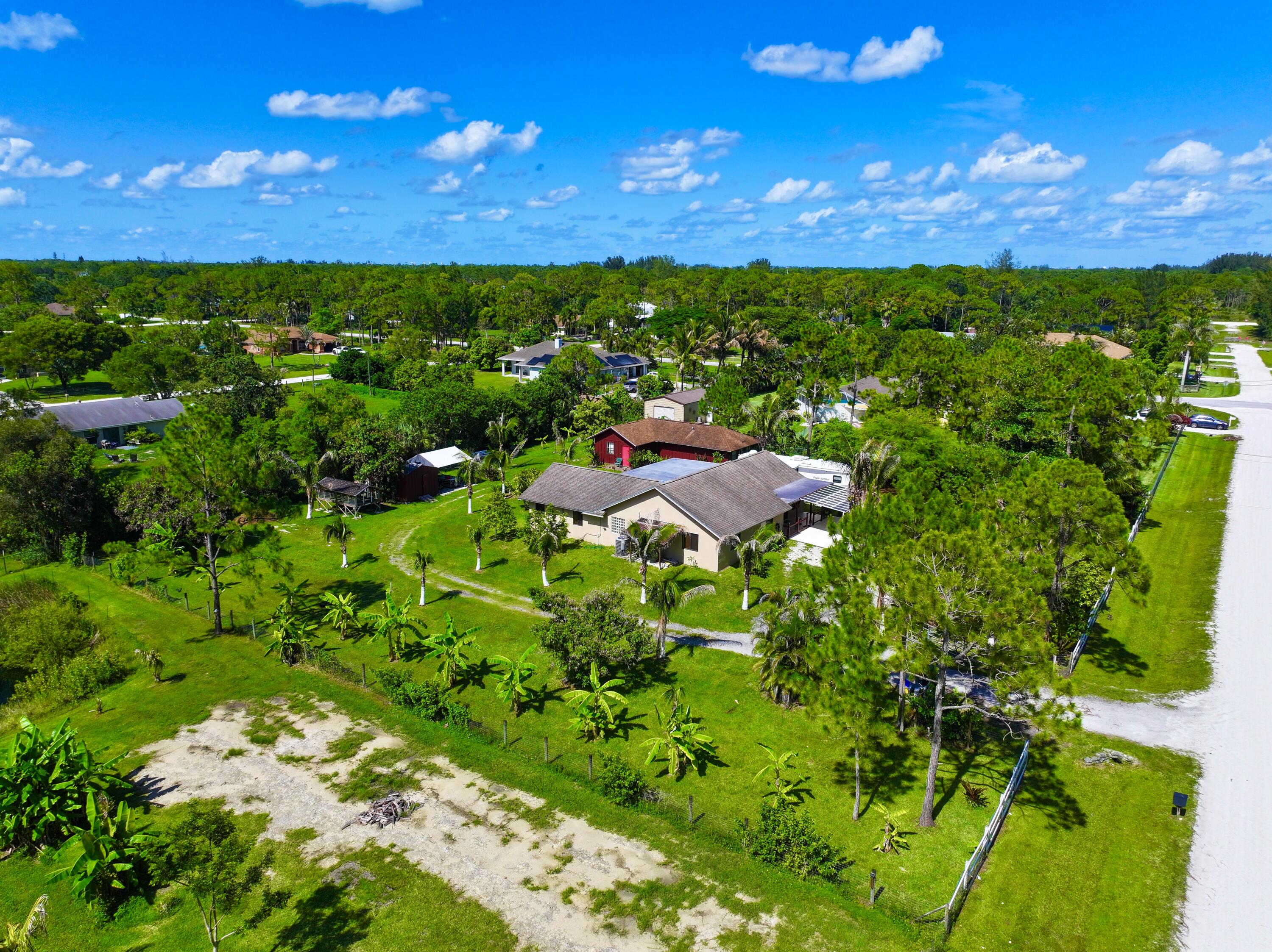 Foto de propiedad en 14539 N 60th Ct Court N, The Acreage, FL 33470 The Acreage con MLS# 