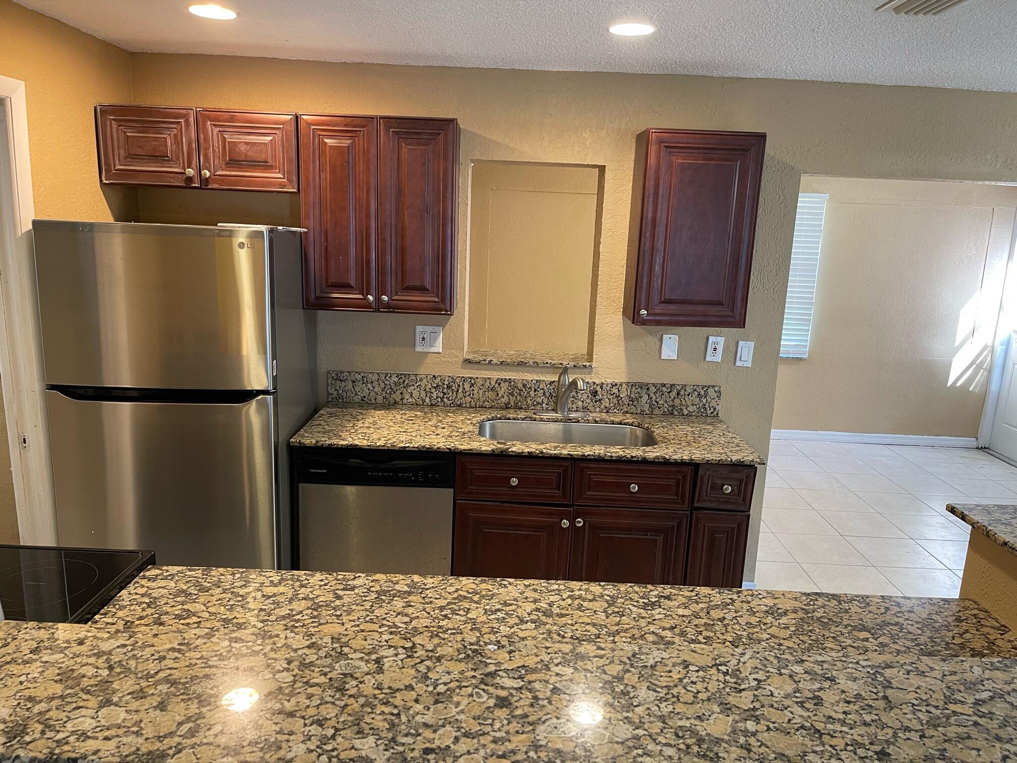Foto de propiedad en 1650 W 12th Court, Riviera Beach, FL 33404 Riviera Beach con MLS# 