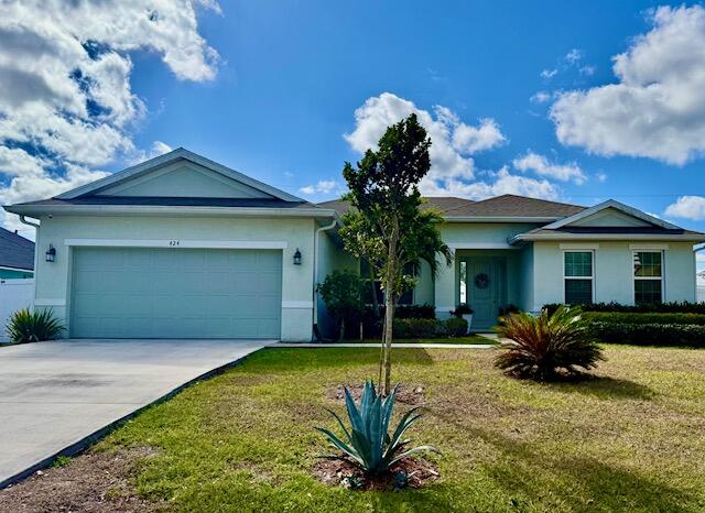 Foto de propiedad en 424 SW Ridgecrest Drive, Port St. Lucie, FL 34953 Port St. Lucie con MLS# 