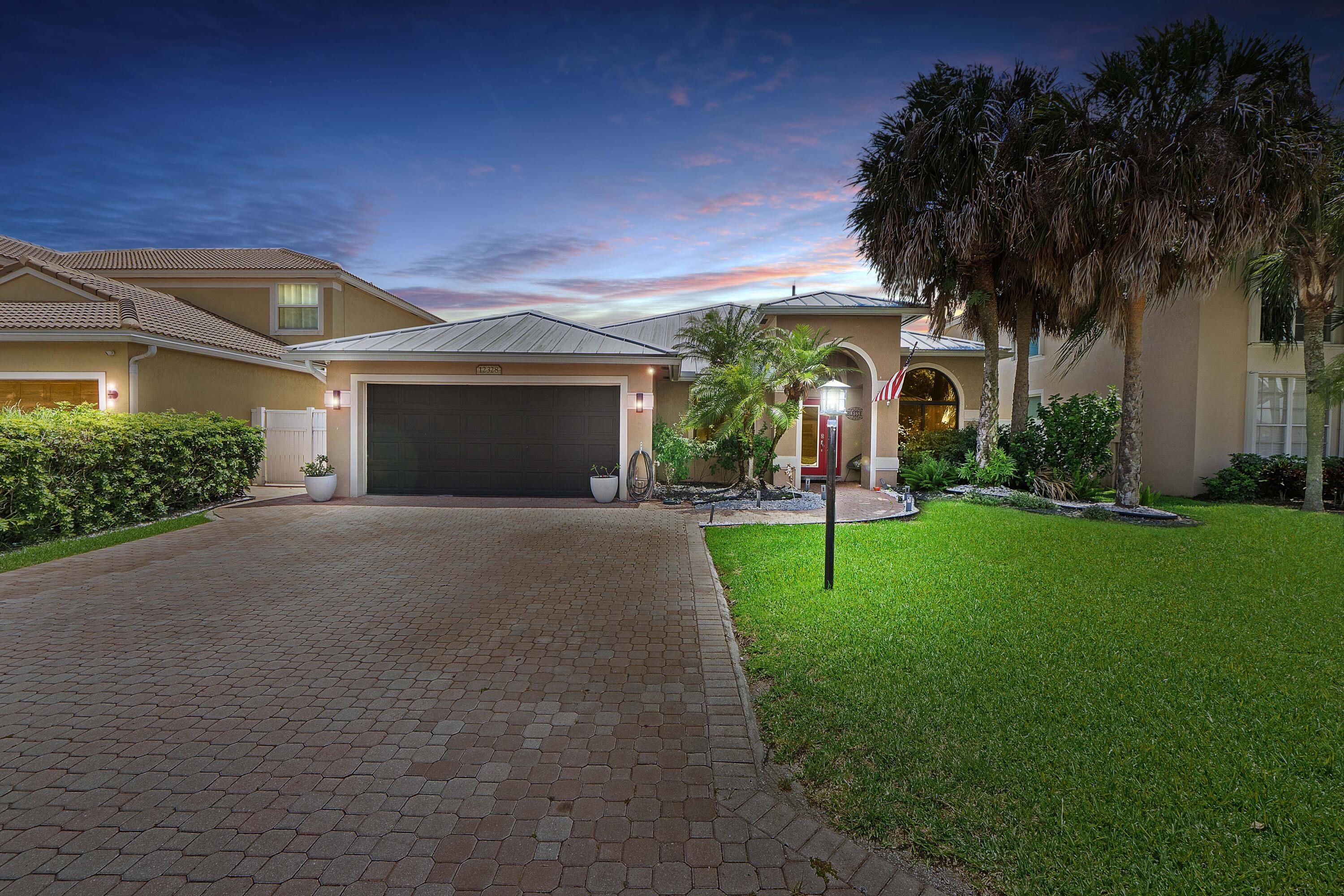 Foto de propiedad en 12328 Saint Simon Drive, Boca Raton, FL 33428 Boca Raton con MLS# 