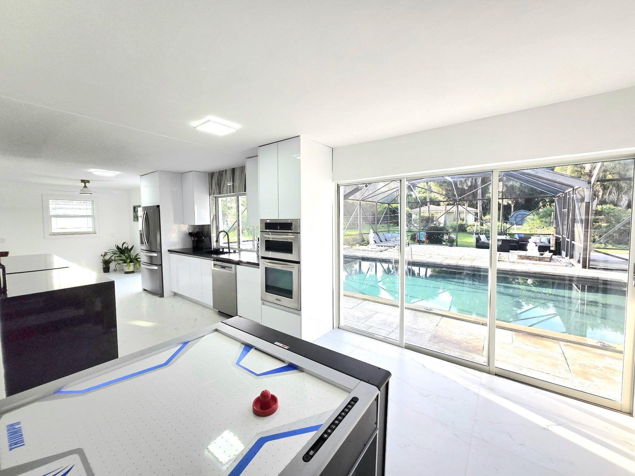 Foto de propiedad en 12231 Areaca Drive, Wellington, FL 33414 Wellington con MLS# 