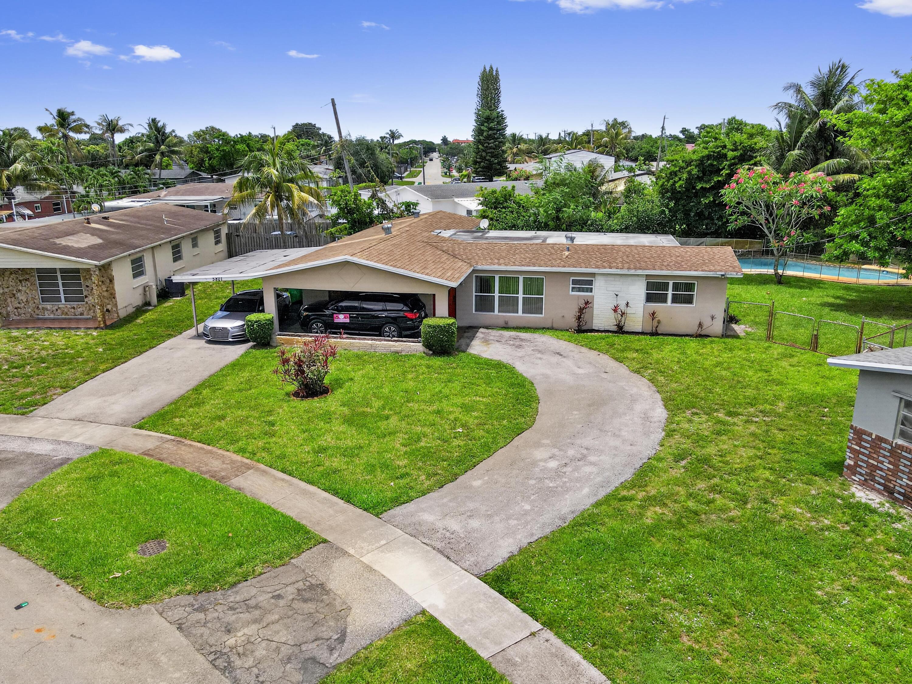 Foto de propiedad en 5801 NW 14th Court, Sunrise, FL 33313 Sunrise con MLS# 