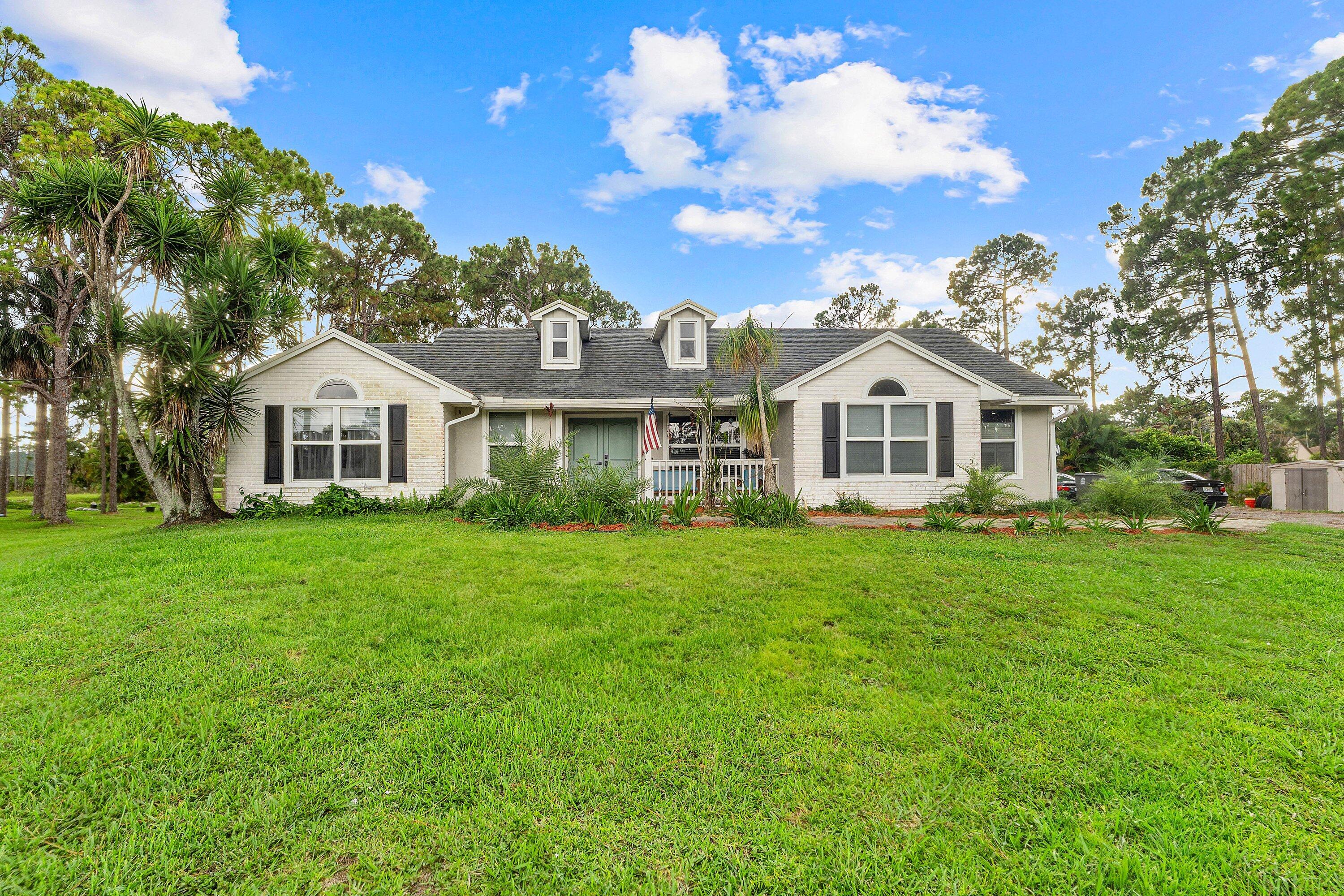 Foto de propiedad en 12744 82nd Street N, West Palm Beach, FL 33412 West Palm Beach con MLS# 