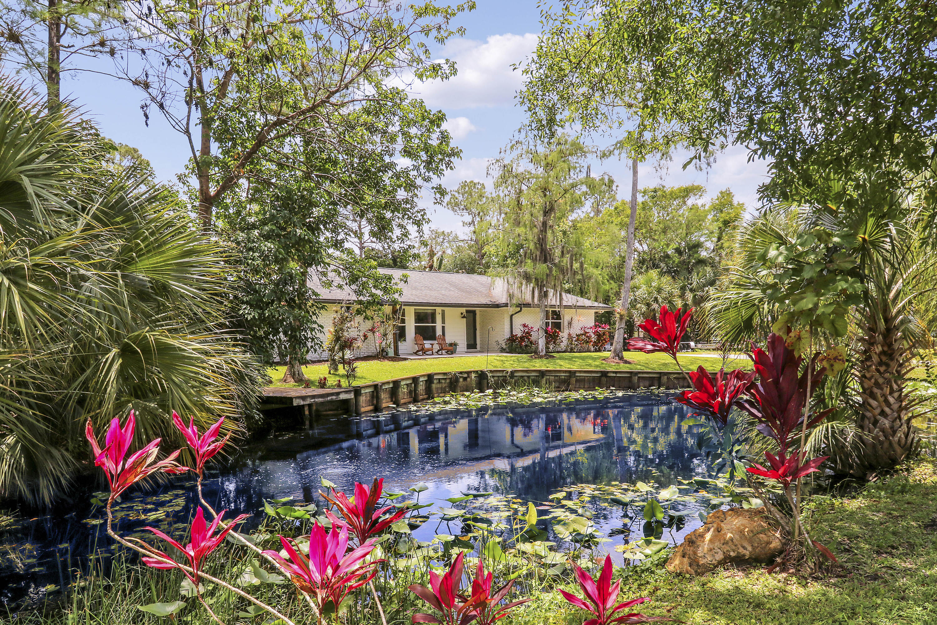 Foto de propiedad en 8352 N 154th Ct Road N, Palm Beach Gardens, FL 33418 Palm Beach Gardens con MLS# 