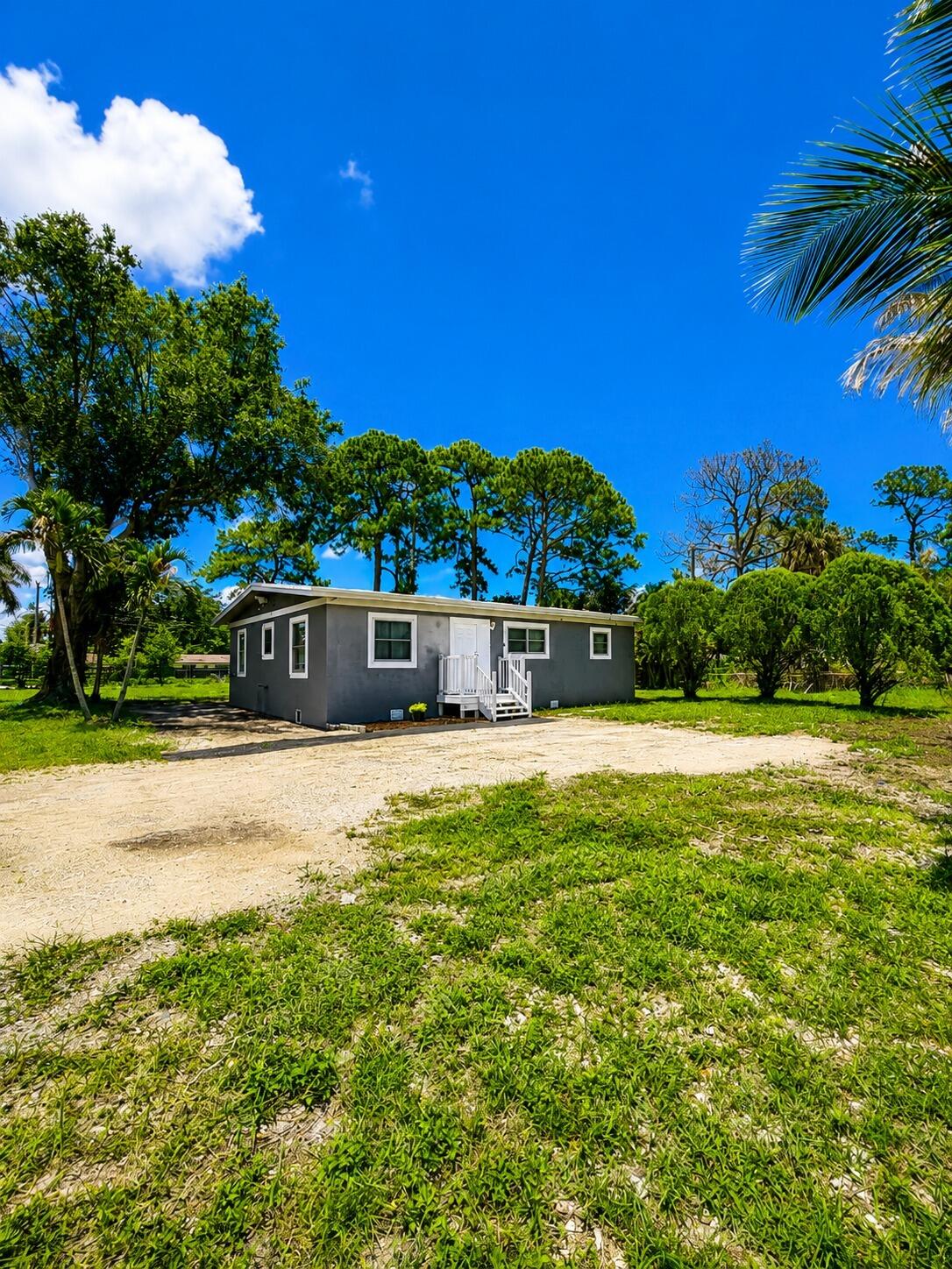 Foto de propiedad en 468 N 53rd Dr Drive N, Royal Palm Estates, FL 33415 Royal Palm Estates con MLS# 