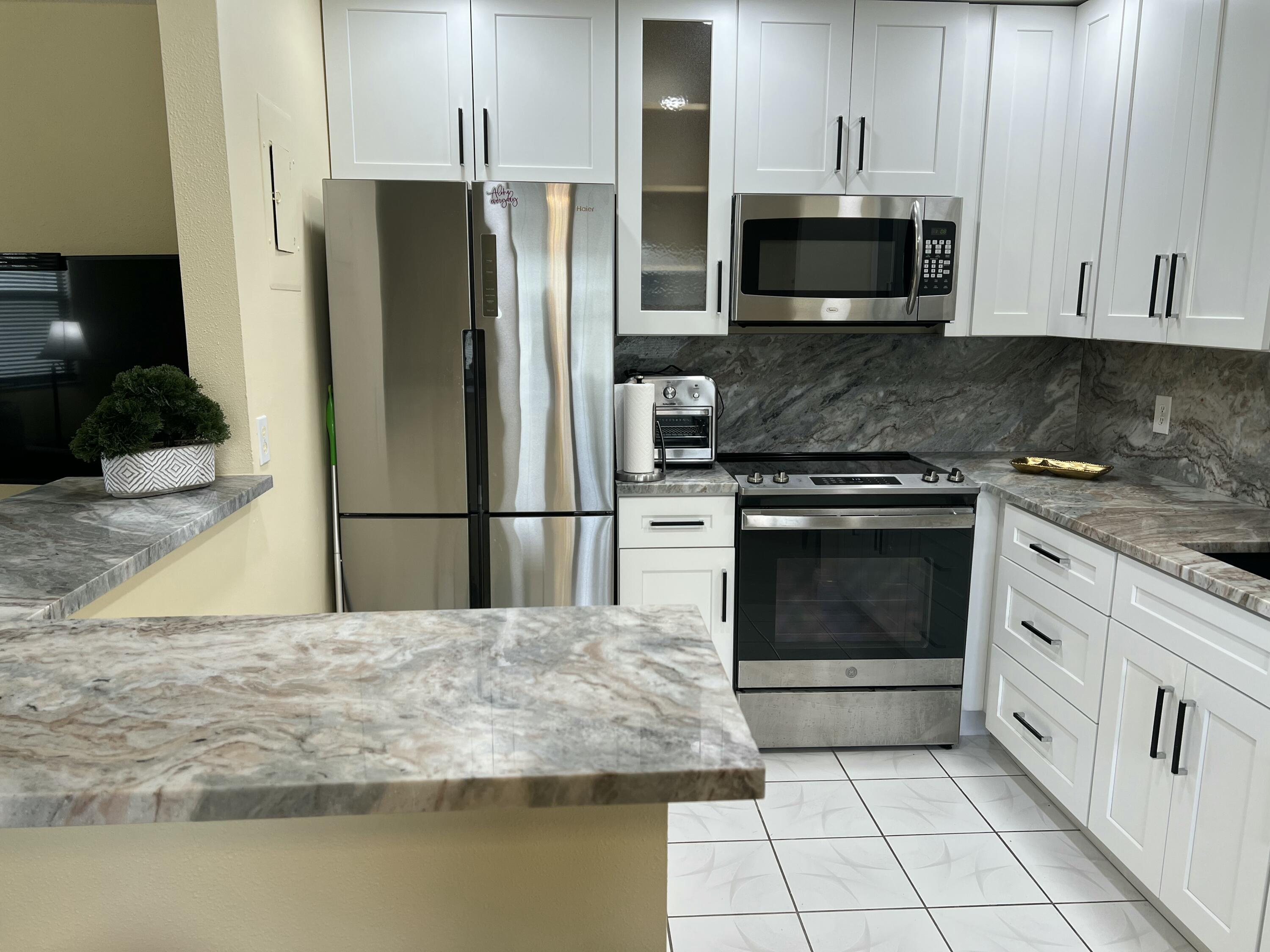 Foto de propiedad en 711 Monaco Court, Delray Beach, FL 33446 Delray Beach con MLS# 