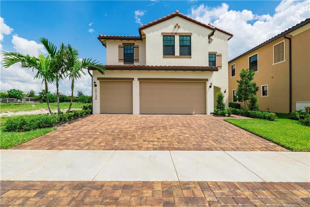 Foto de propiedad en 12135 E Baypoint Circle, Parkland, FL 33076 Parkland con MLS# 