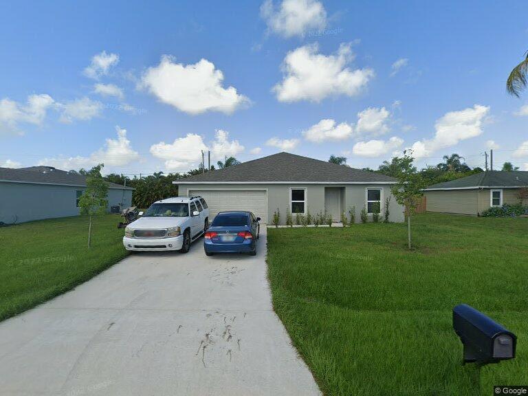 Foto de propiedad en 1085 SW Firestone Avenue, Port St. Lucie, FL 34953 Port St. Lucie con MLS# 