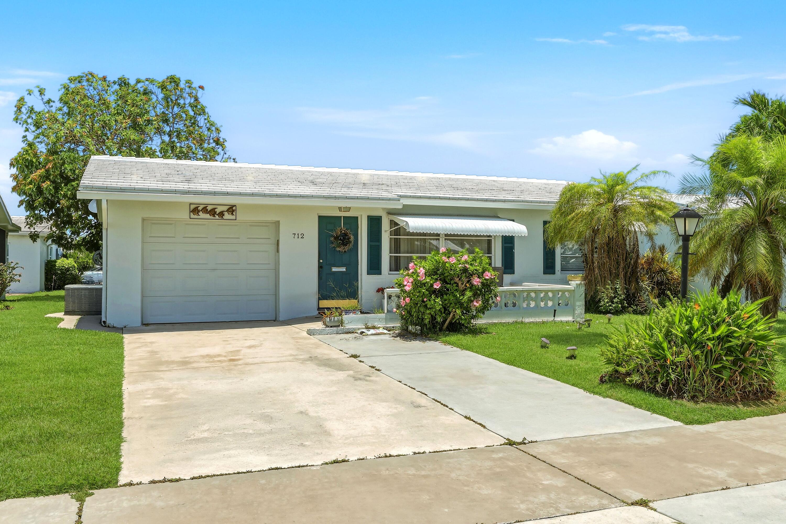 Foto de propiedad en 712 SW 18th Street, Boynton Beach, FL 33426 Boynton Beach con MLS# 