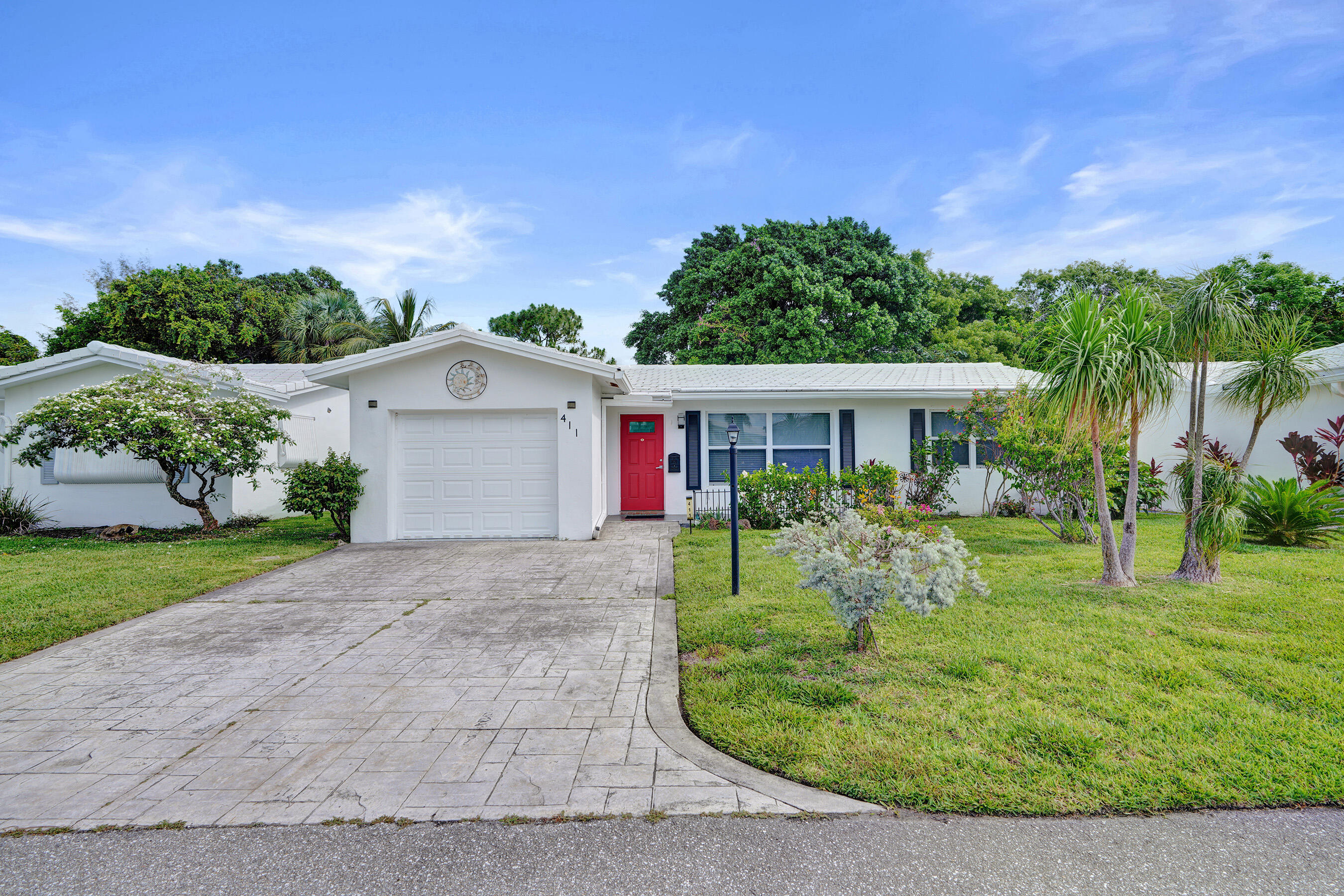Foto de propiedad en 411 NW 26th Court, Pompano Beach, FL 33064 Pompano Beach con MLS# 