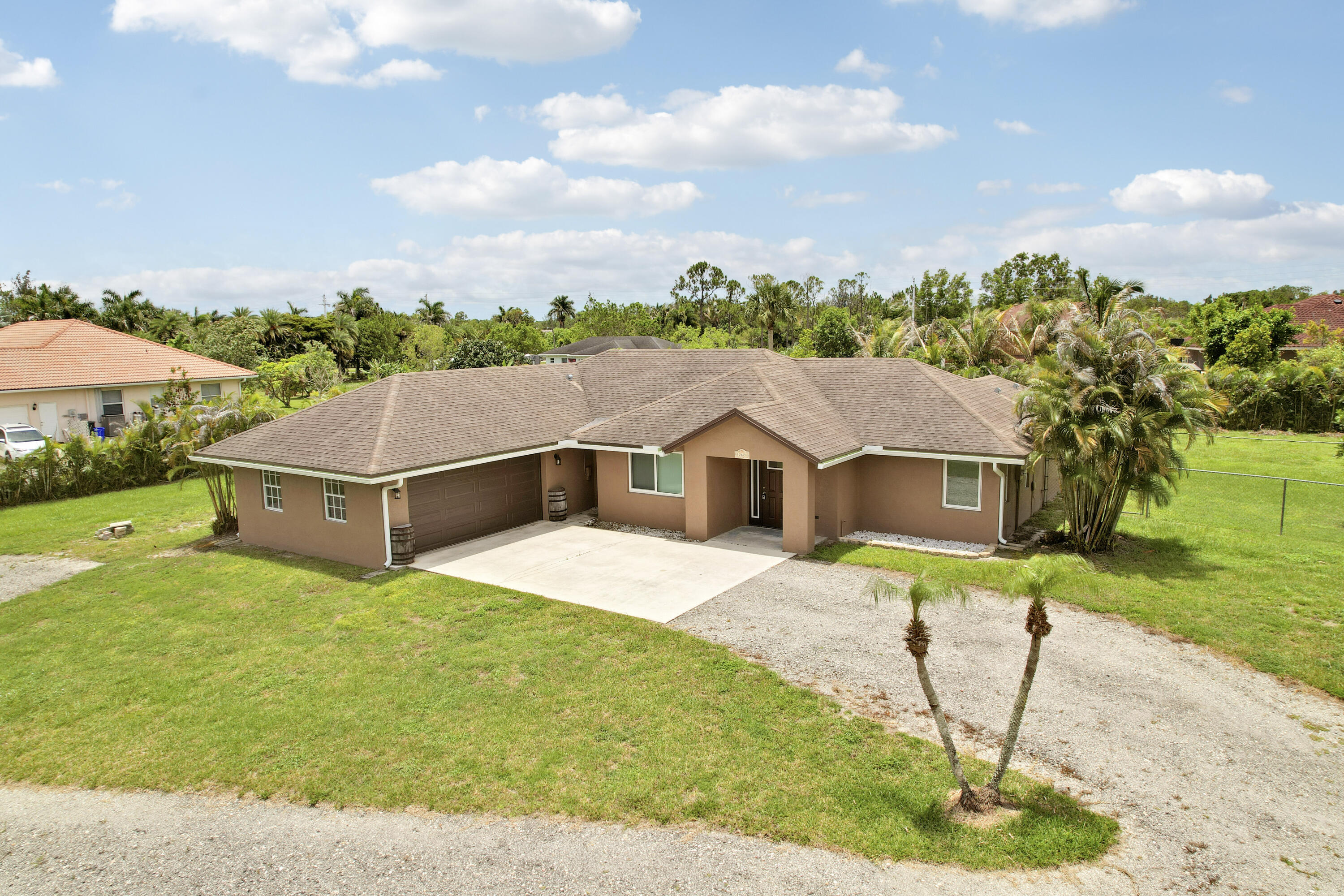 Foto de propiedad en 12628 N 70th Pl Place N, The Acreage, FL 33412 The Acreage con MLS# 