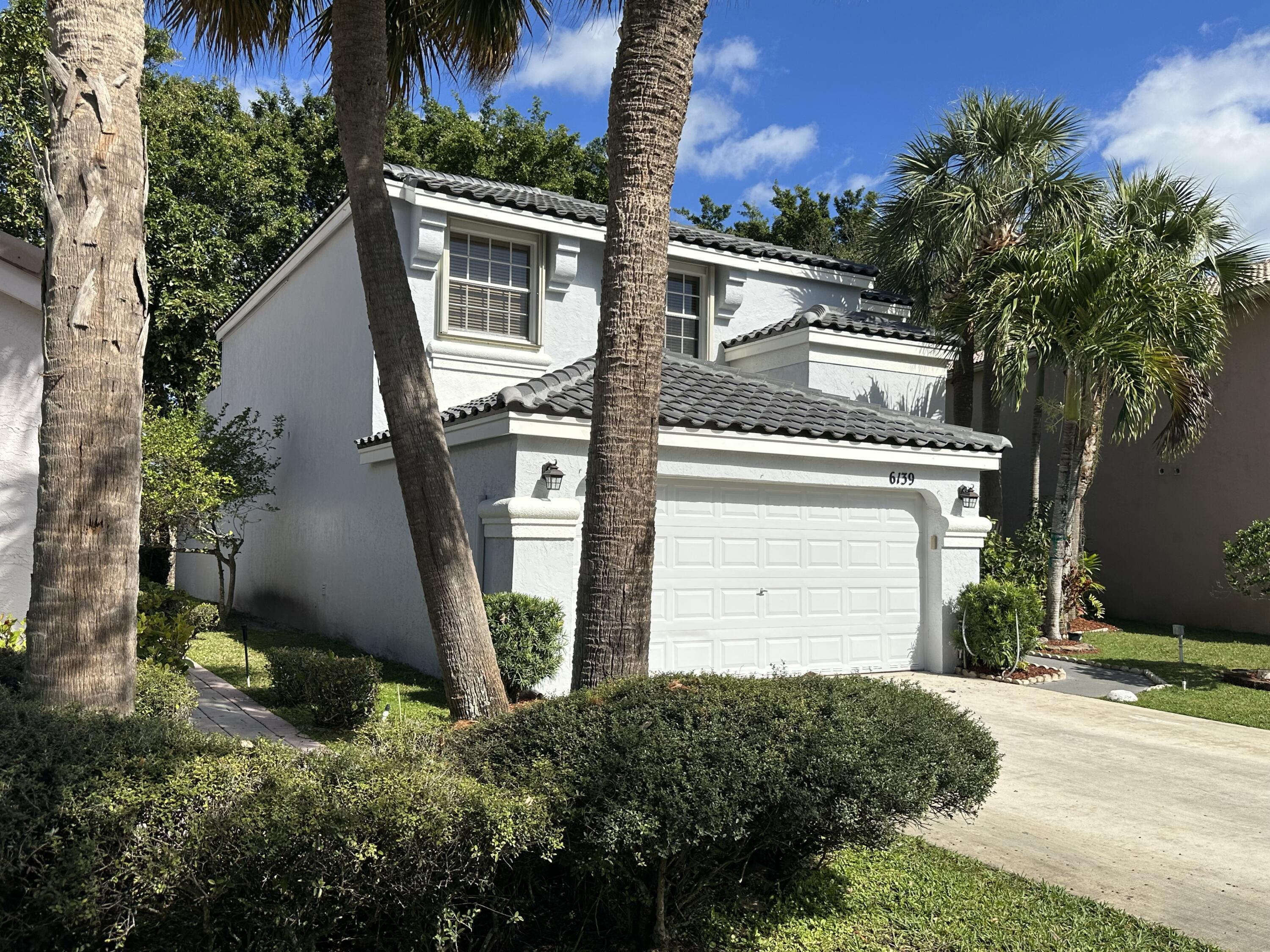 Foto de propiedad en 6139 Branchwood Drive, Lake Worth, FL 33467 Lake Worth con MLS# 