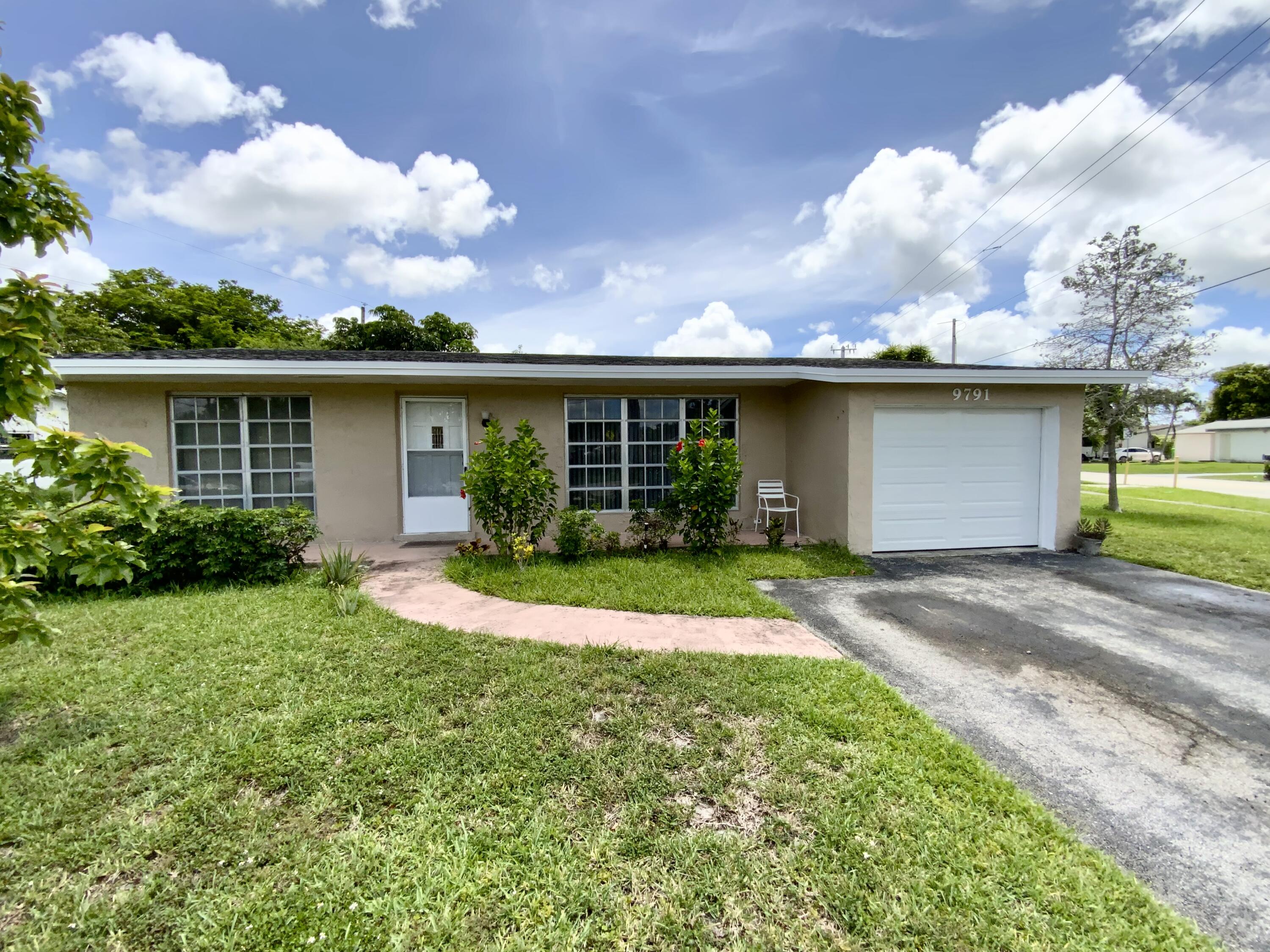 Foto de propiedad en 9791 NW 25th Court, Sunrise, FL 33322 Sunrise con MLS# 