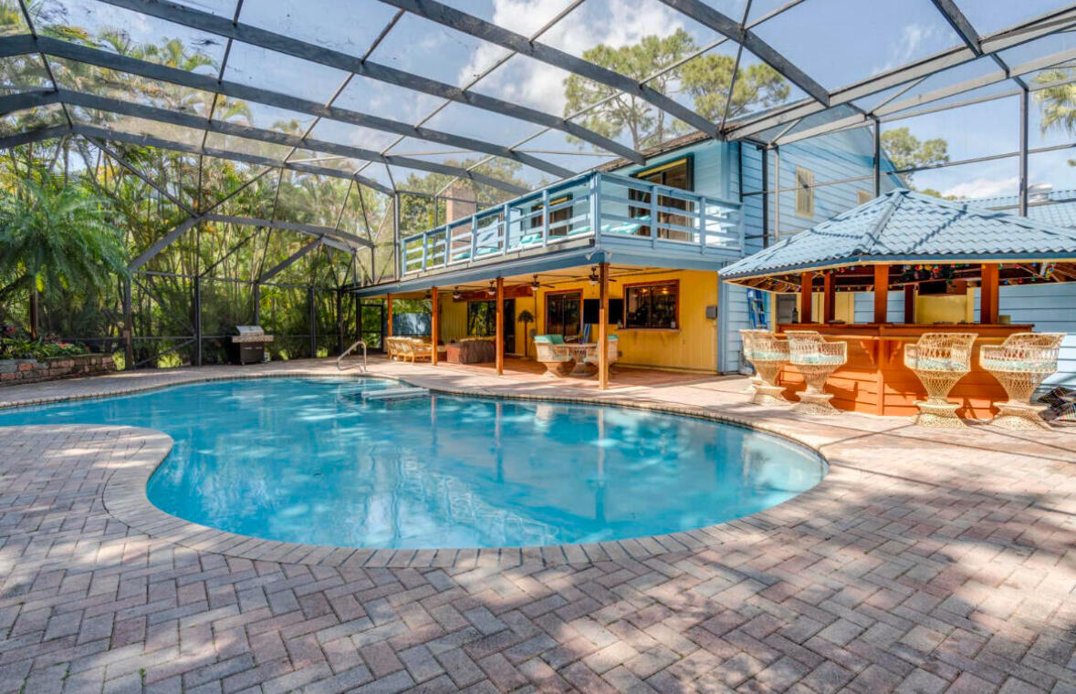 Foto de propiedad en 12288 N 165th Rd Road N, Jupiter Farms, FL 33478 Jupiter Farms con MLS# 