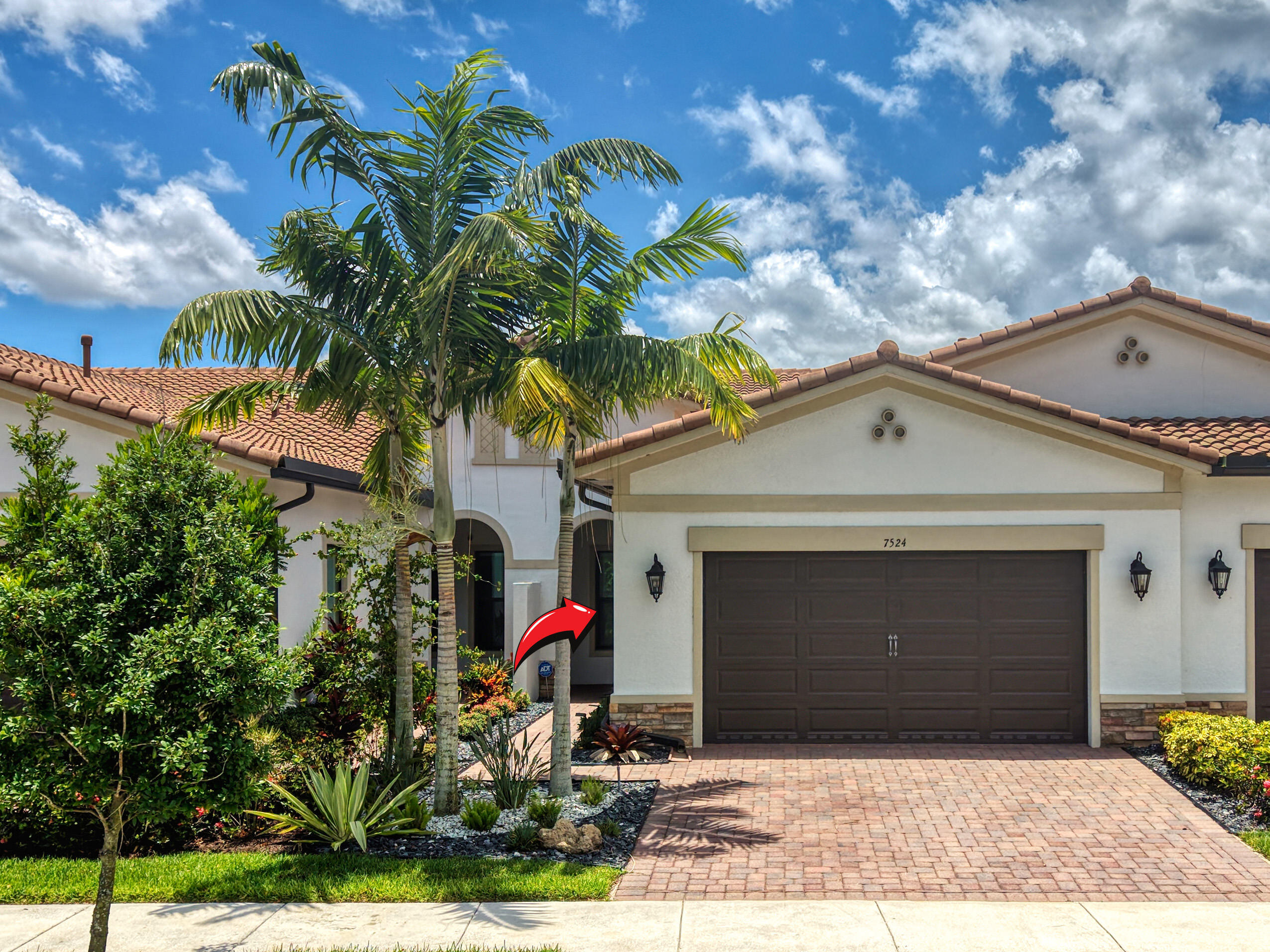 Foto de propiedad en 7524 N Blue Spring Drive, Parkland, FL 33067 Parkland con MLS# 
