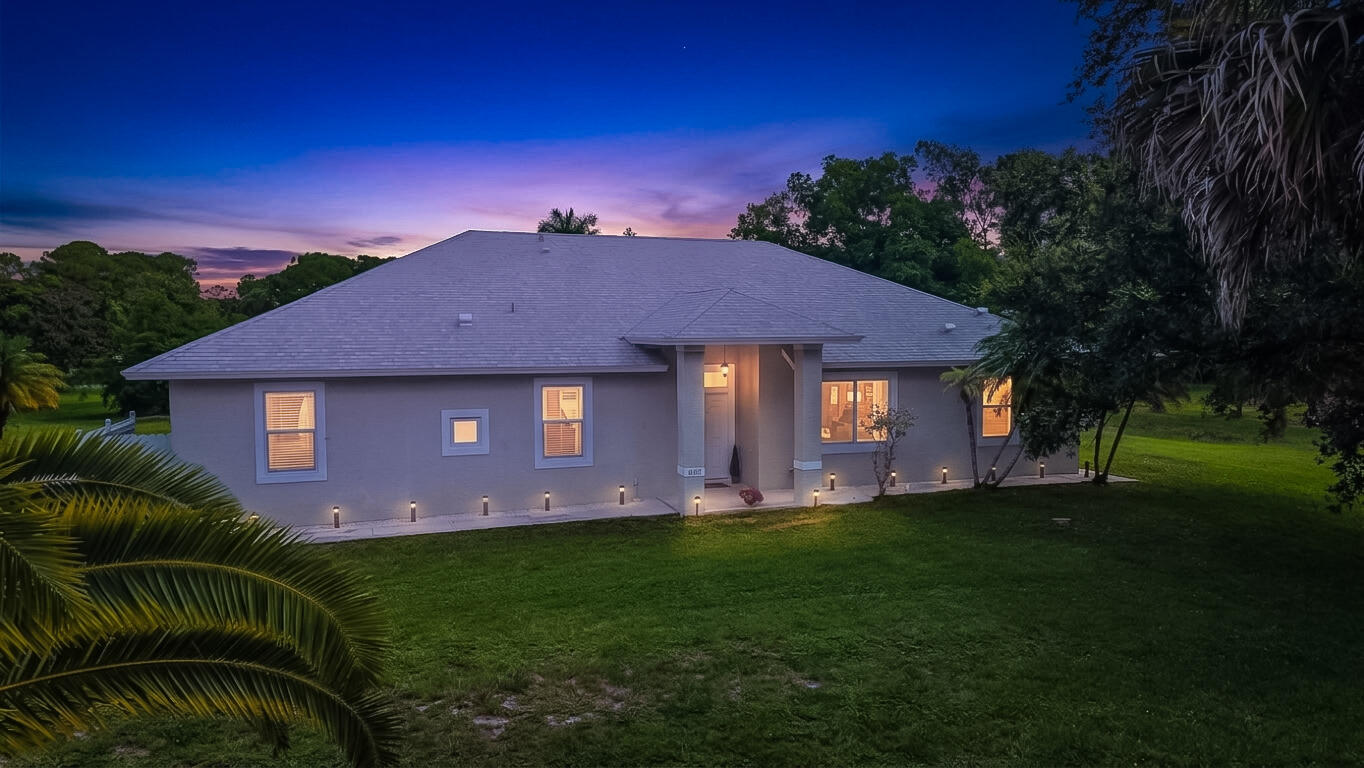 Foto de propiedad en 6681 140th Lane N, Palm Beach Gardens, FL 33418 Palm Beach Gardens con MLS# 