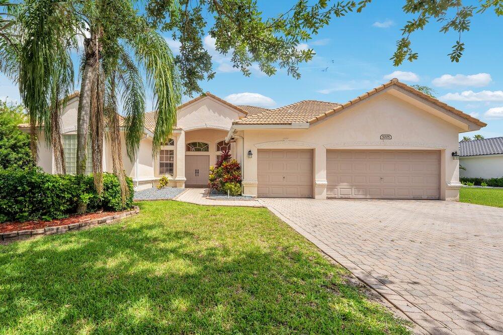 Foto de propiedad en 5005 NW 57th Terrace, Coral Springs, FL 33067 Coral Springs con MLS# 
