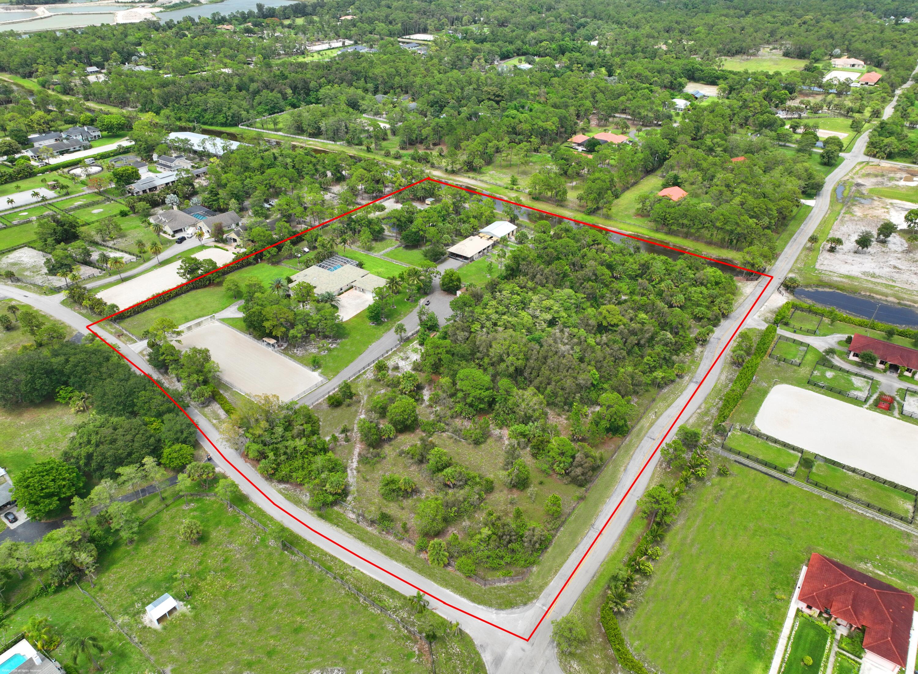 Foto de propiedad en 2560 Buck Ridge Trail, Loxahatchee, FL 33470 Loxahatchee con MLS# 