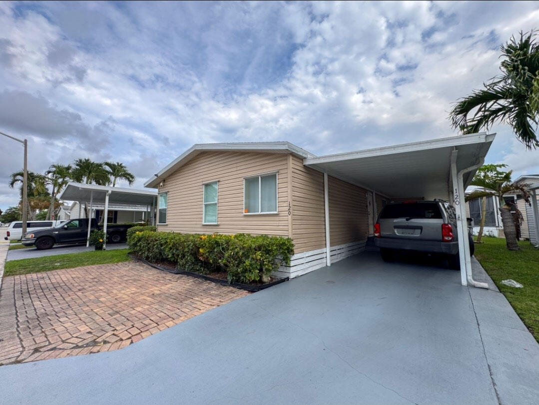 Foto de propiedad en 120 Plantation Boulevard 120, Lake Worth, FL 33467 Lake Worth con MLS# 