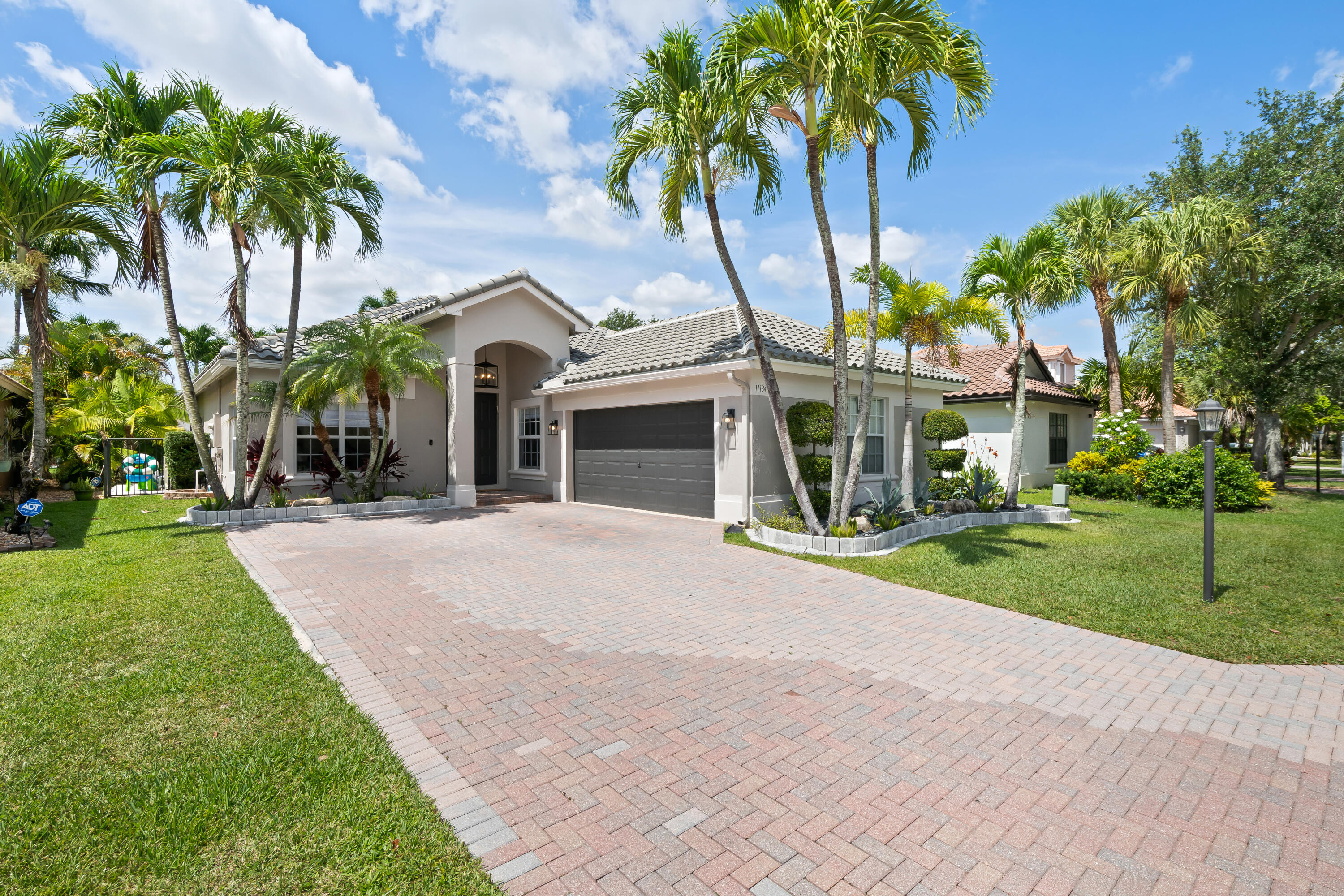 Foto de propiedad en 11184 NW 65th Court, Parkland, FL 33076 Parkland con MLS# 