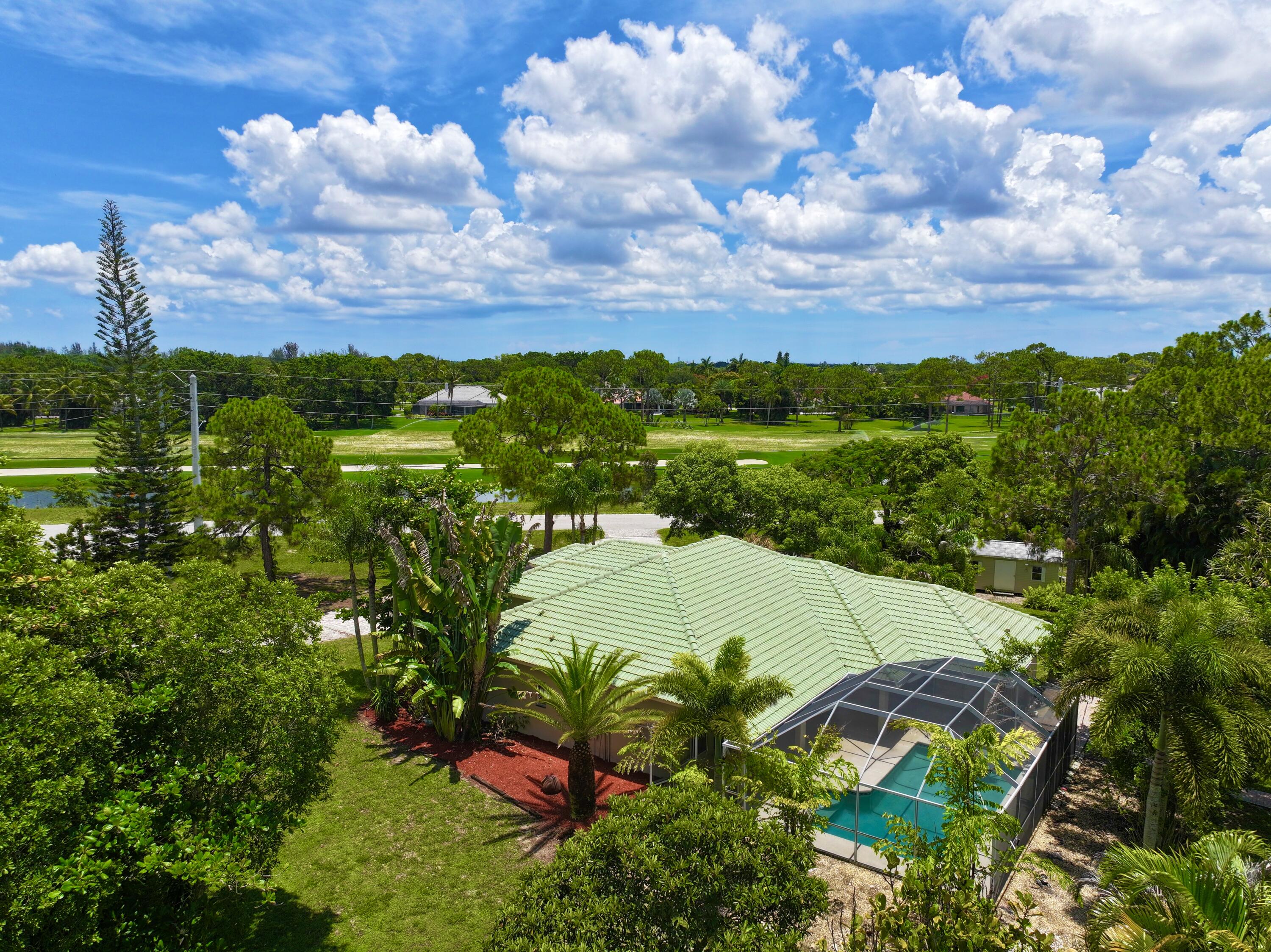 Foto de propiedad en 12037 Temple Boulevard, The Acreage, FL 33412 The Acreage con MLS# 