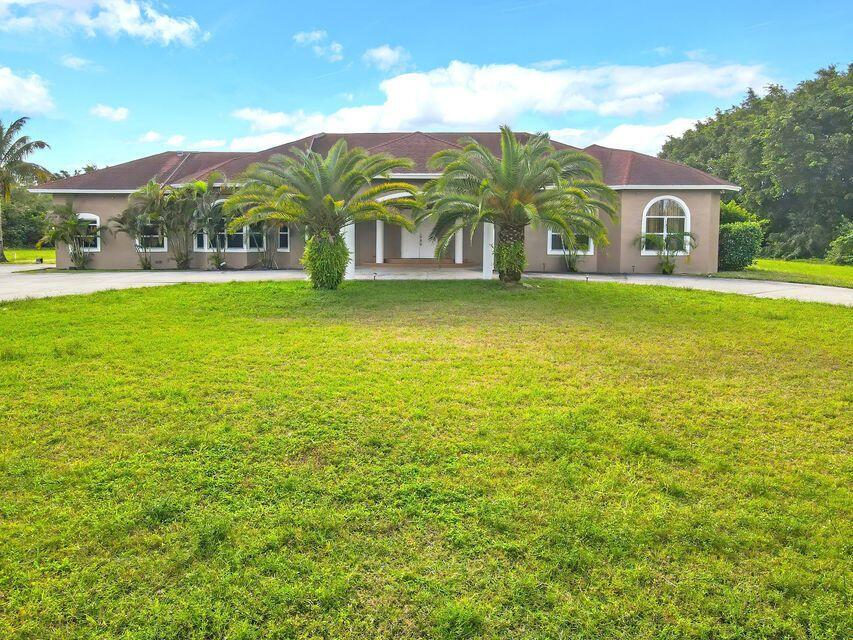 Foto de propiedad en 14094 43rd Road N, Loxahatchee Groves, FL 33470 Loxahatchee Groves con MLS# 
