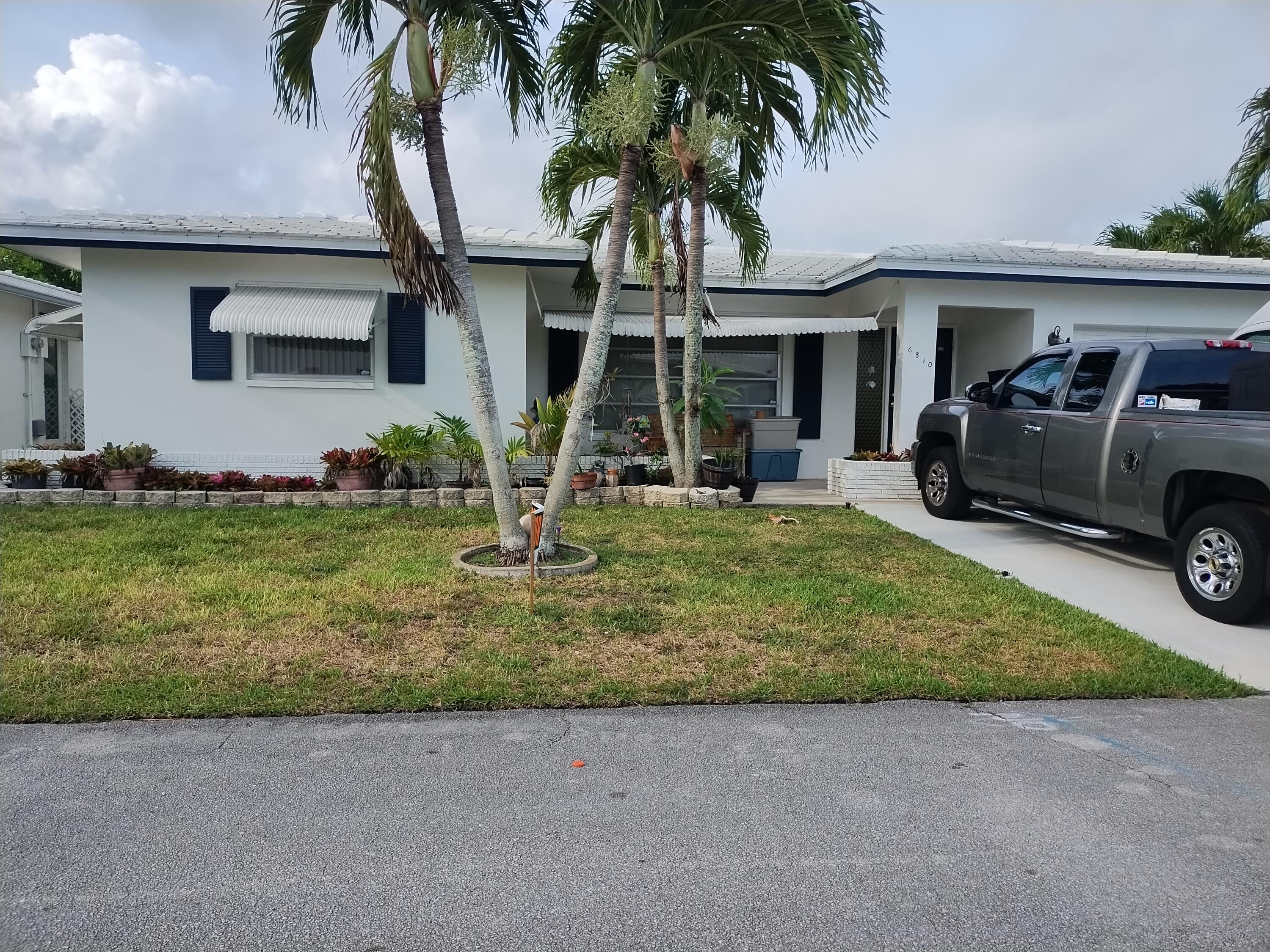 Foto de propiedad en 6810 NW 75th Street, Tamarac, FL 33321 Tamarac con MLS# 