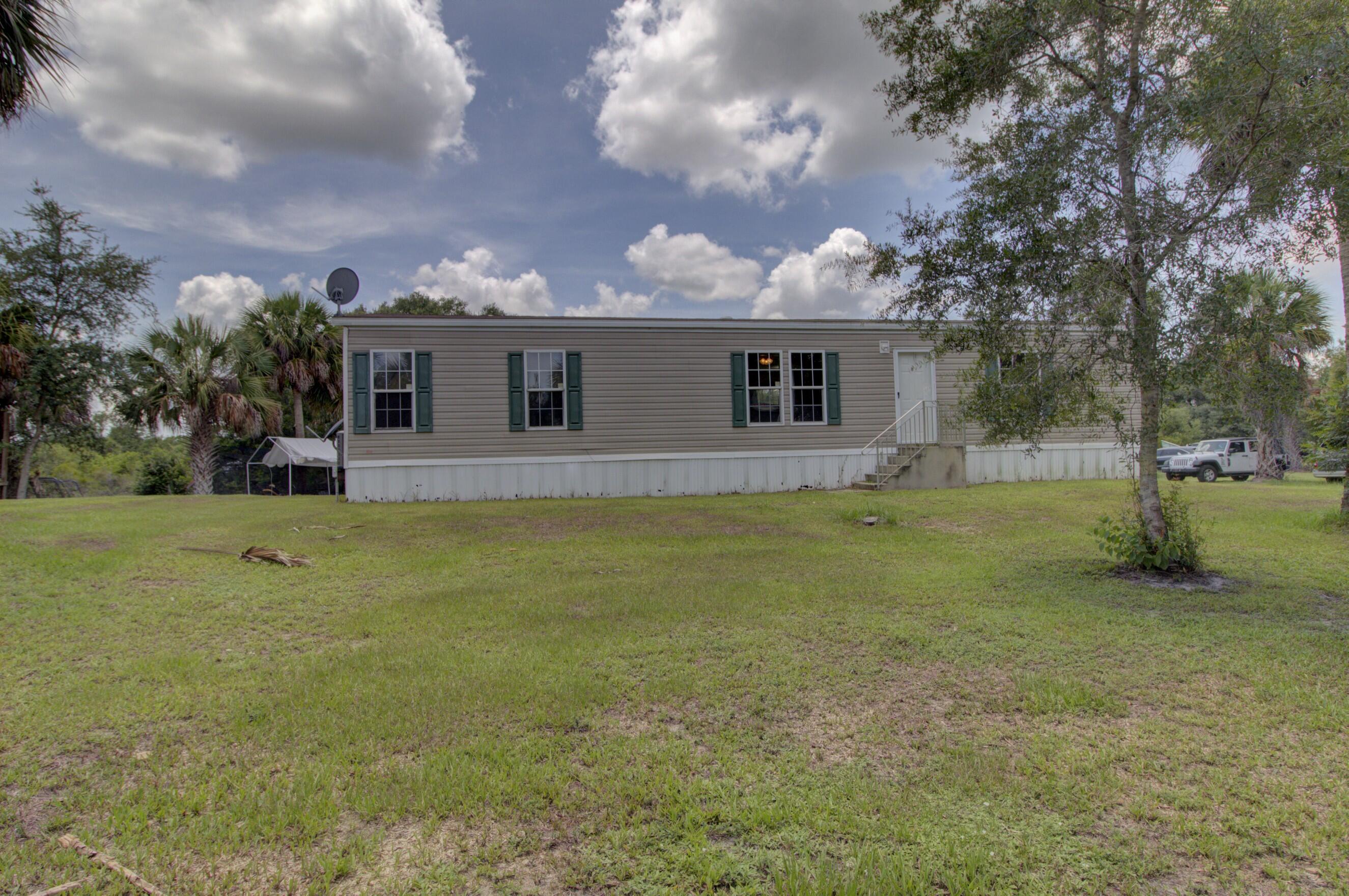 Foto de propiedad en 19212 NW 280th Street, Okeechobee, FL 34972 Okeechobee con MLS# 