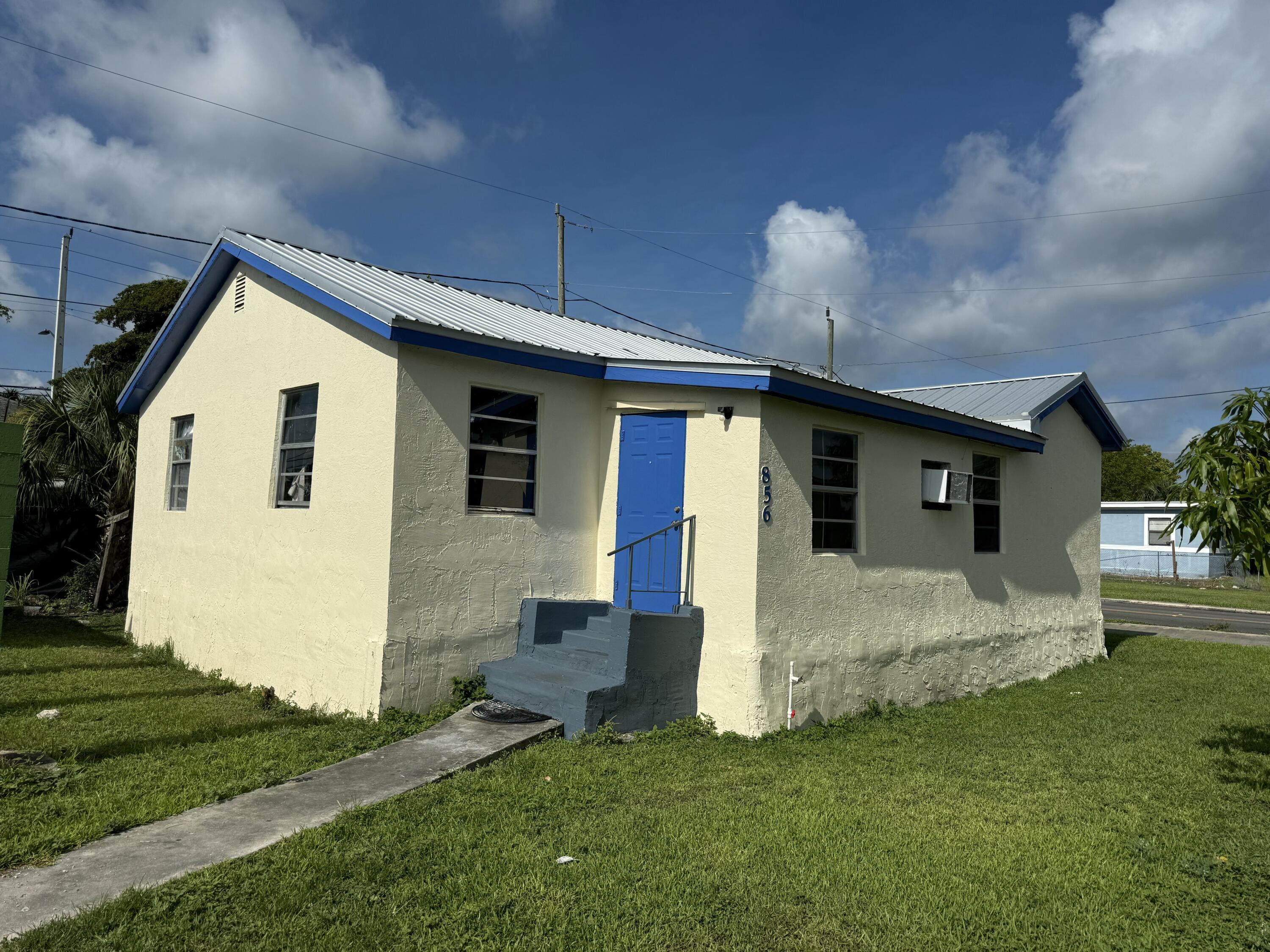 Foto de propiedad en 856 SW Ave D, Belle Glade, FL 33430 Belle Glade con MLS# 