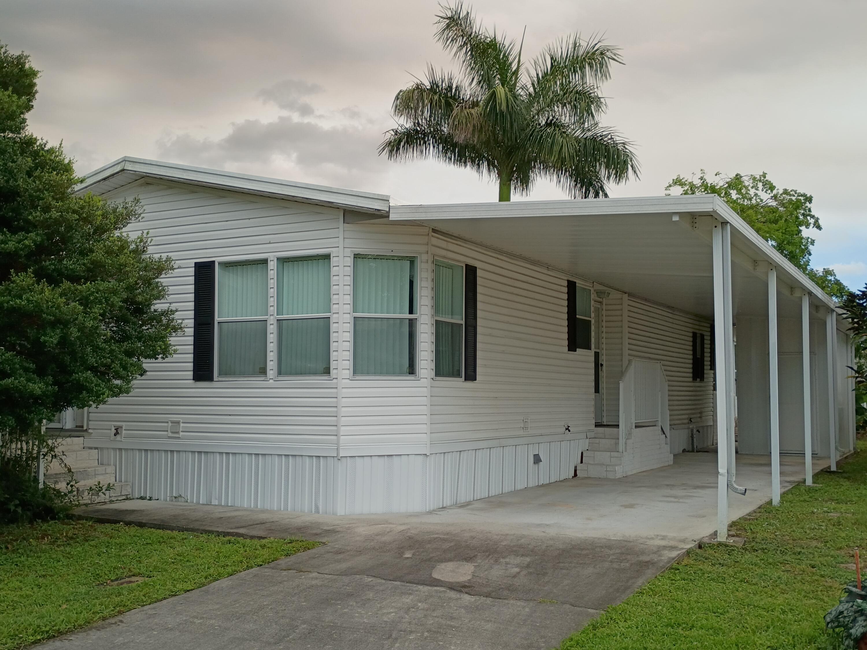 Foto de propiedad en 2080 SW 85th Avenue, Davie, FL 33324 Davie con MLS# 