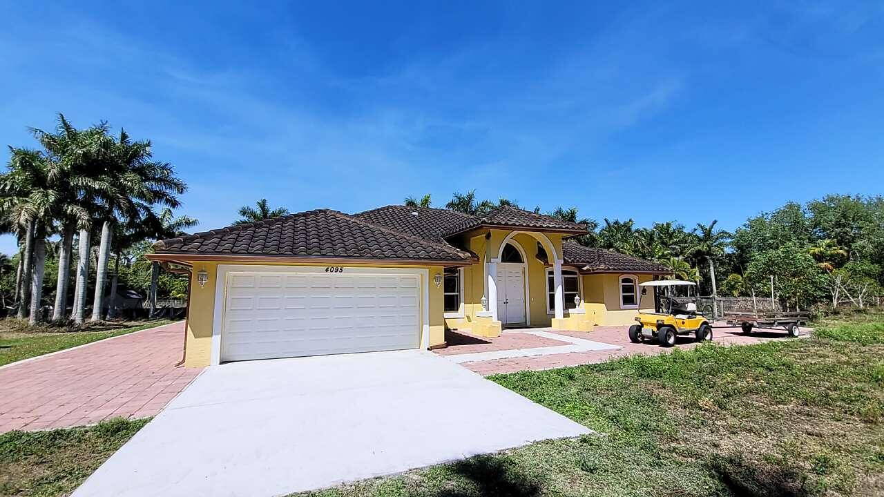 Foto de propiedad en 4095 Windmill Road, Loxahatchee, FL 33470 Loxahatchee con MLS# 