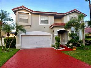 Foto de propiedad en 2410 NW 137th Terrace, Sunrise, FL 33323 Sunrise con MLS# 