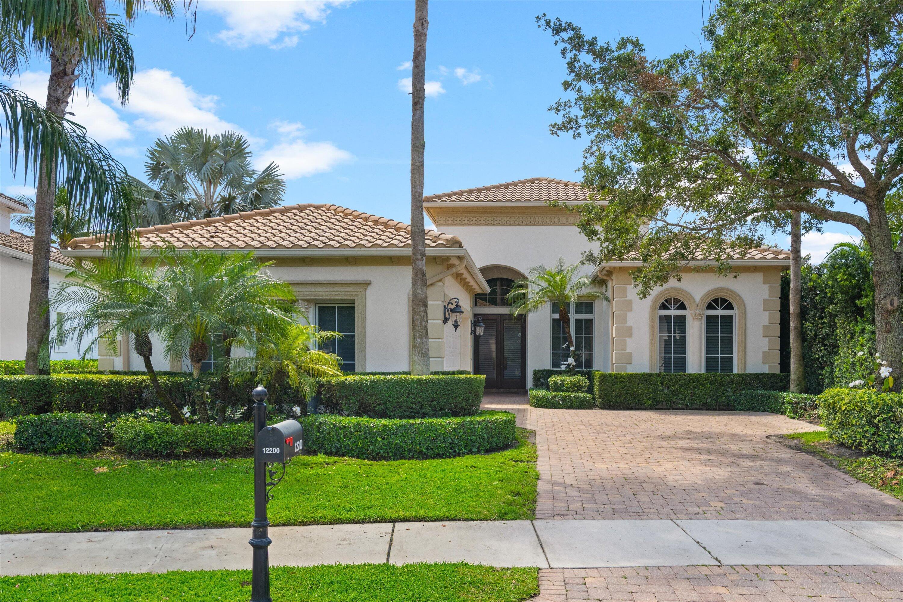 Foto de propiedad en 12200 Sunnydale Drive, Wellington, FL 33414 Wellington con MLS# 